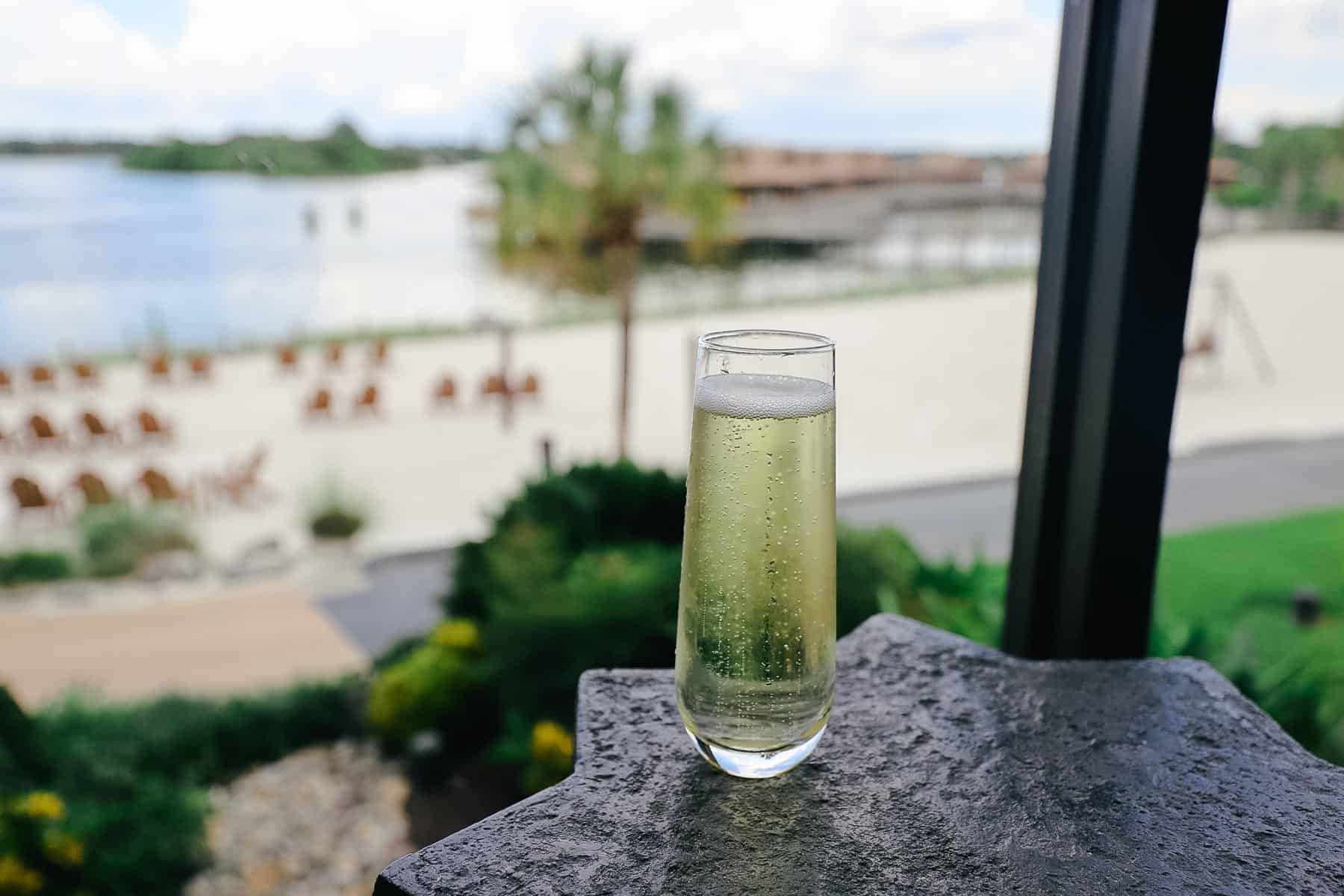 glass of champagne compliments of the Kamehameha Club 