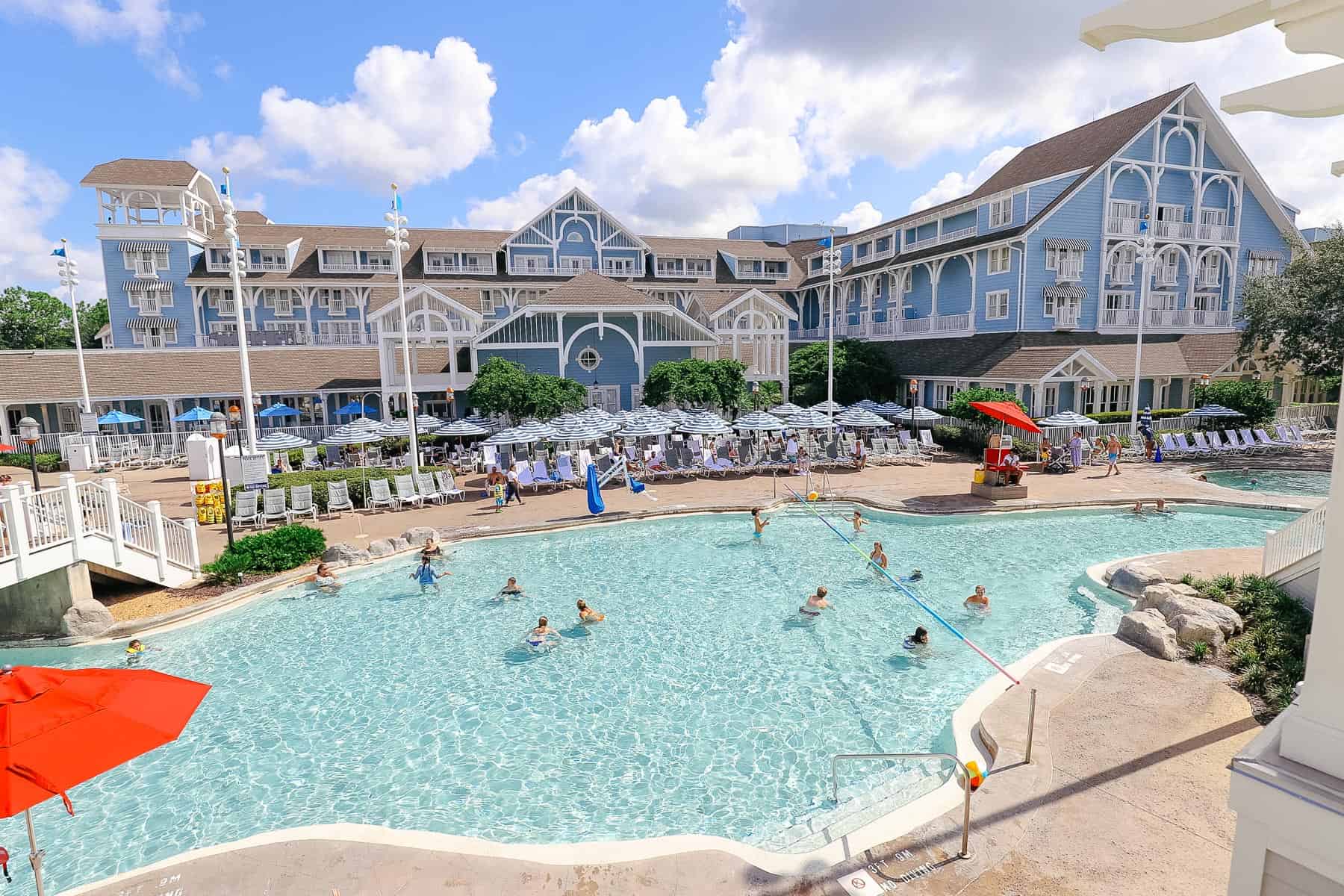 Guests enjoying the pool area at the Beach Club. 