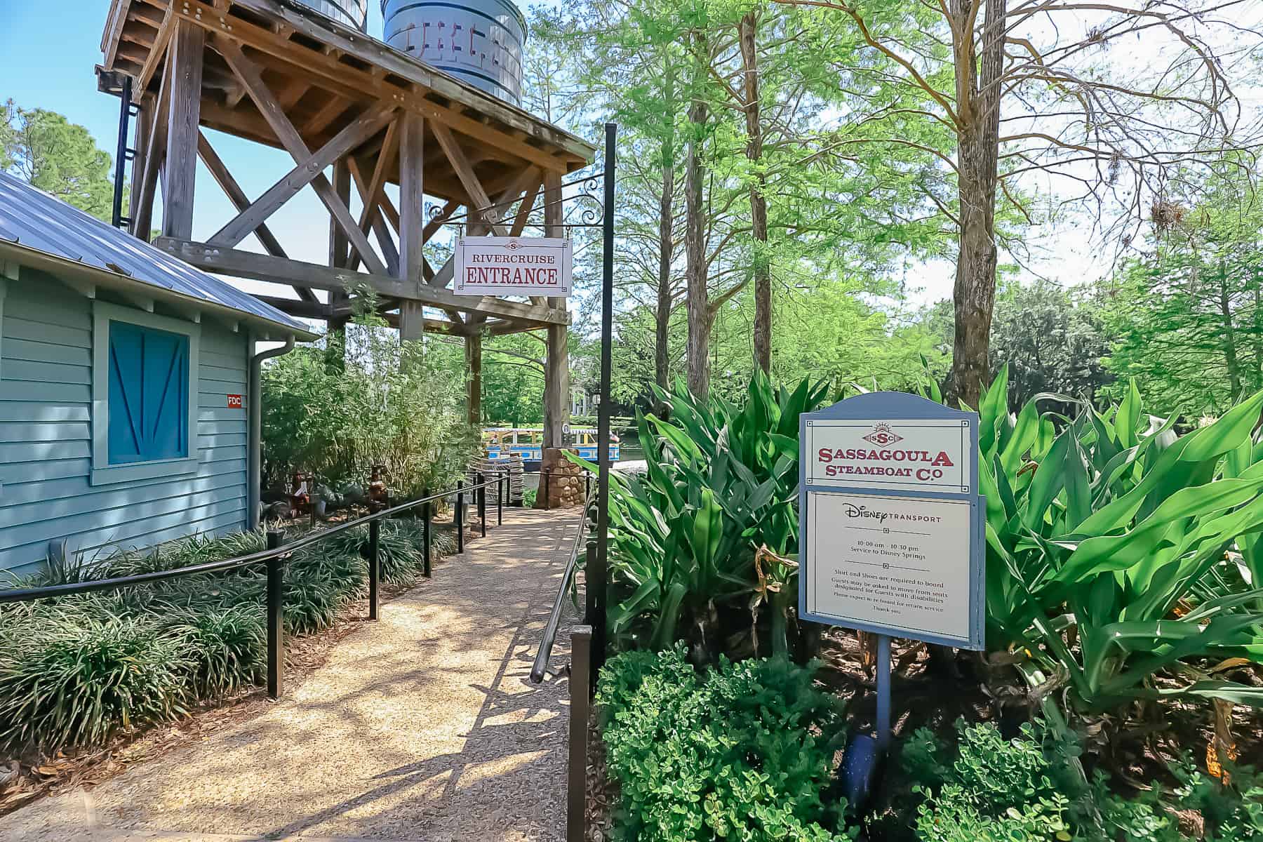 a sign that tells guests the times for the River Cruise (Water Taxis) at Port Orleans Riverside 