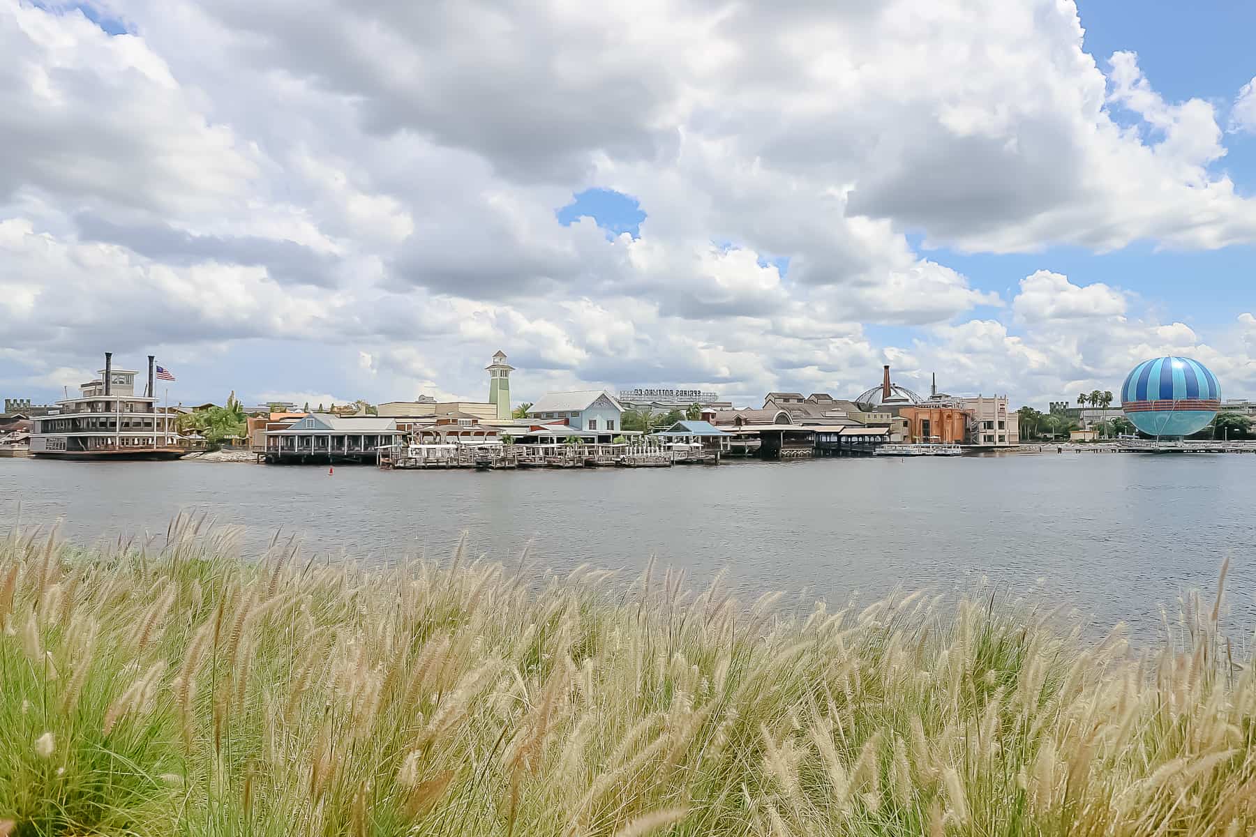 a view of Disney Springs on the lake 