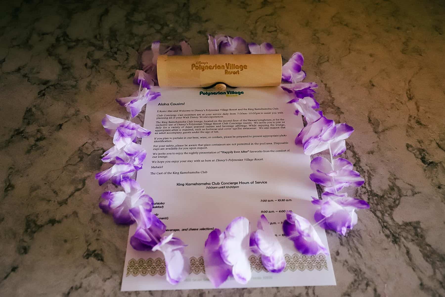 A lei, special gift, and welcome letter left in our club level room. 