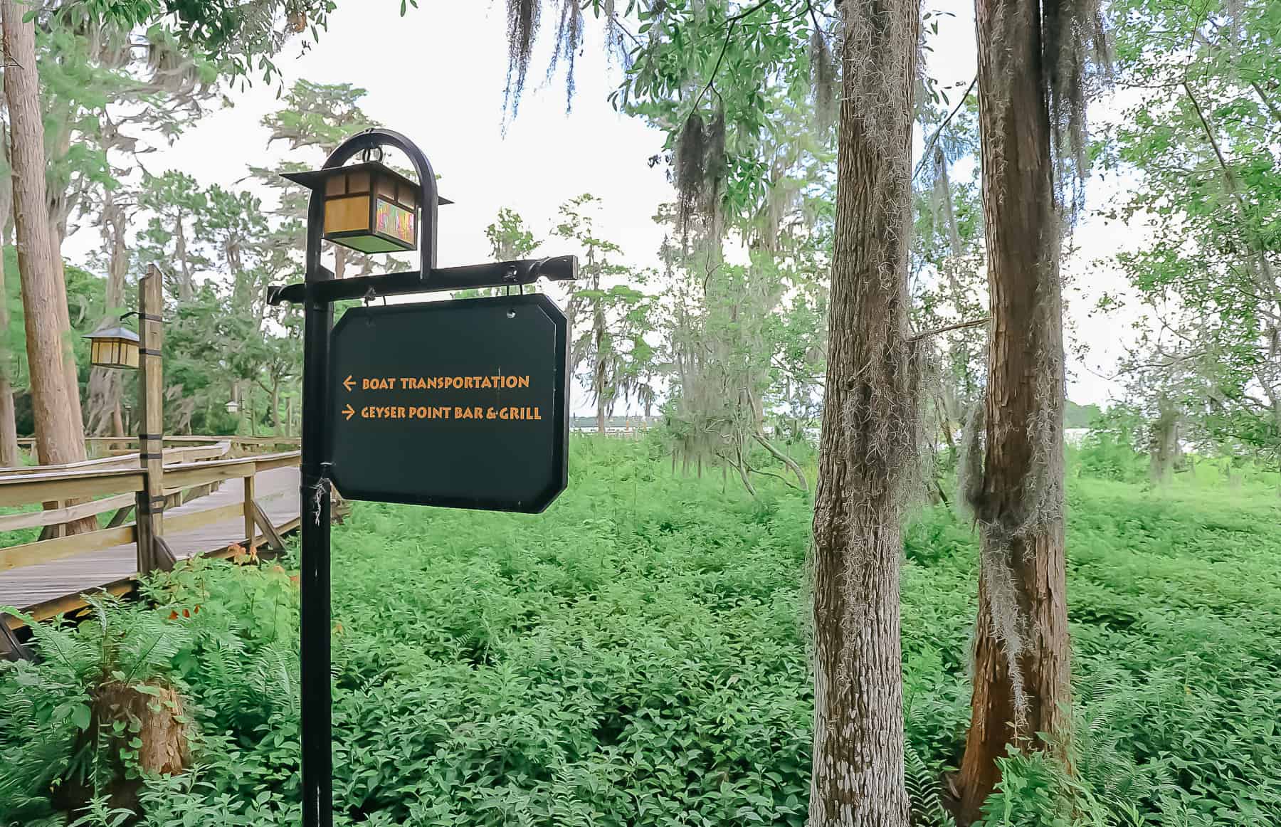 Signage indicates path to boat launch at Disney's Wilderness Lodge. 