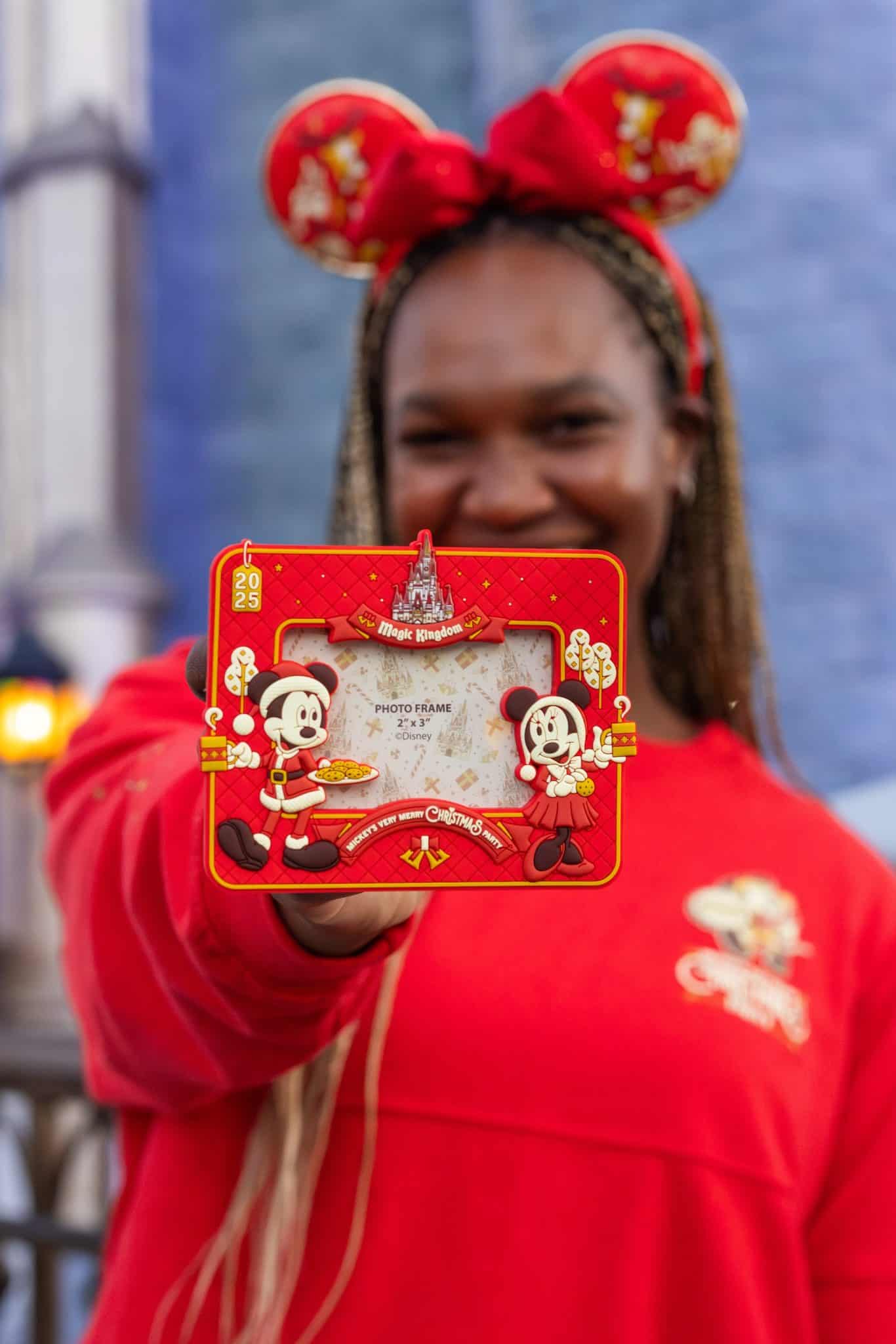 a photo frame with red and gold with the Mickey's Christmas Party 2025 logo 