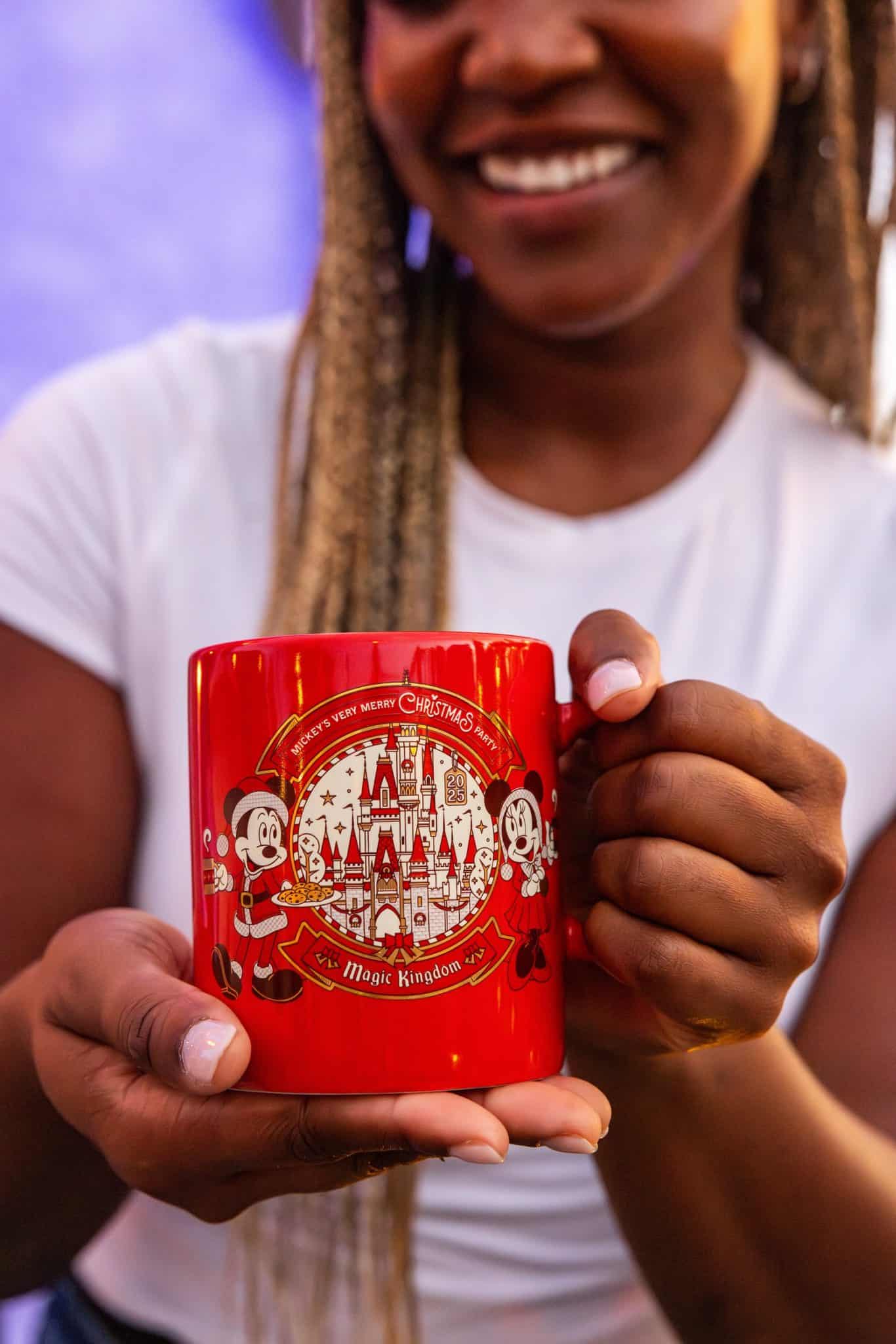 a red mug celebrating Mickey and Minnie's Christmas Party 