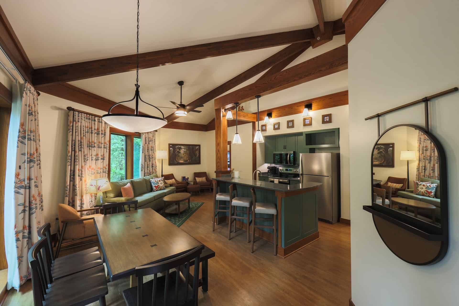 the combined dining, living, and kitchen in the refreshed Treehouse Villas