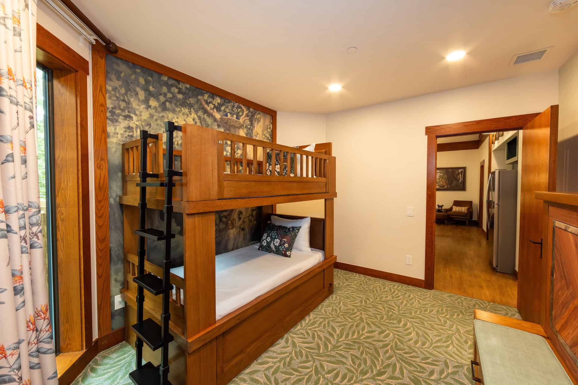 a pair of bunk beds in the second bedroom