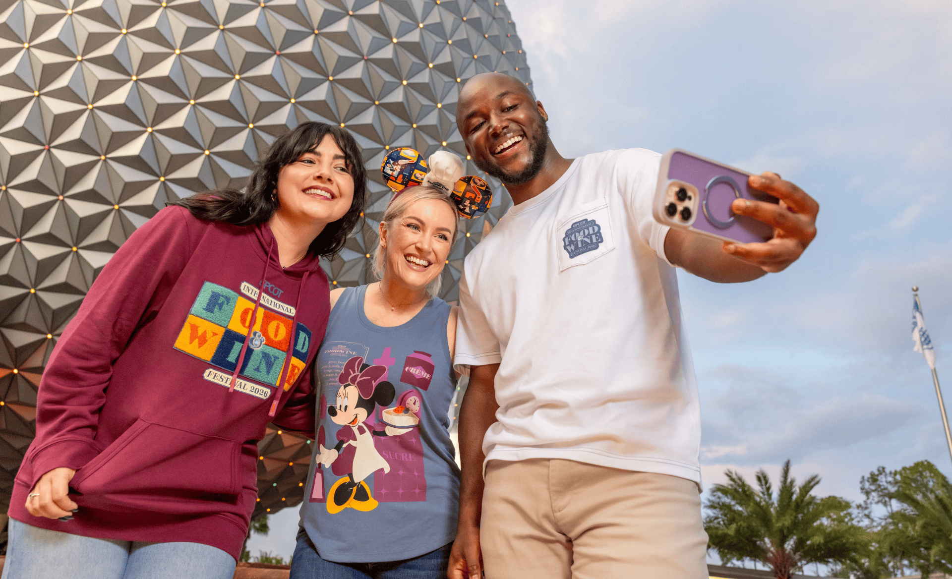 a group of people wearing 2026 Food and Wine Festival merchandise