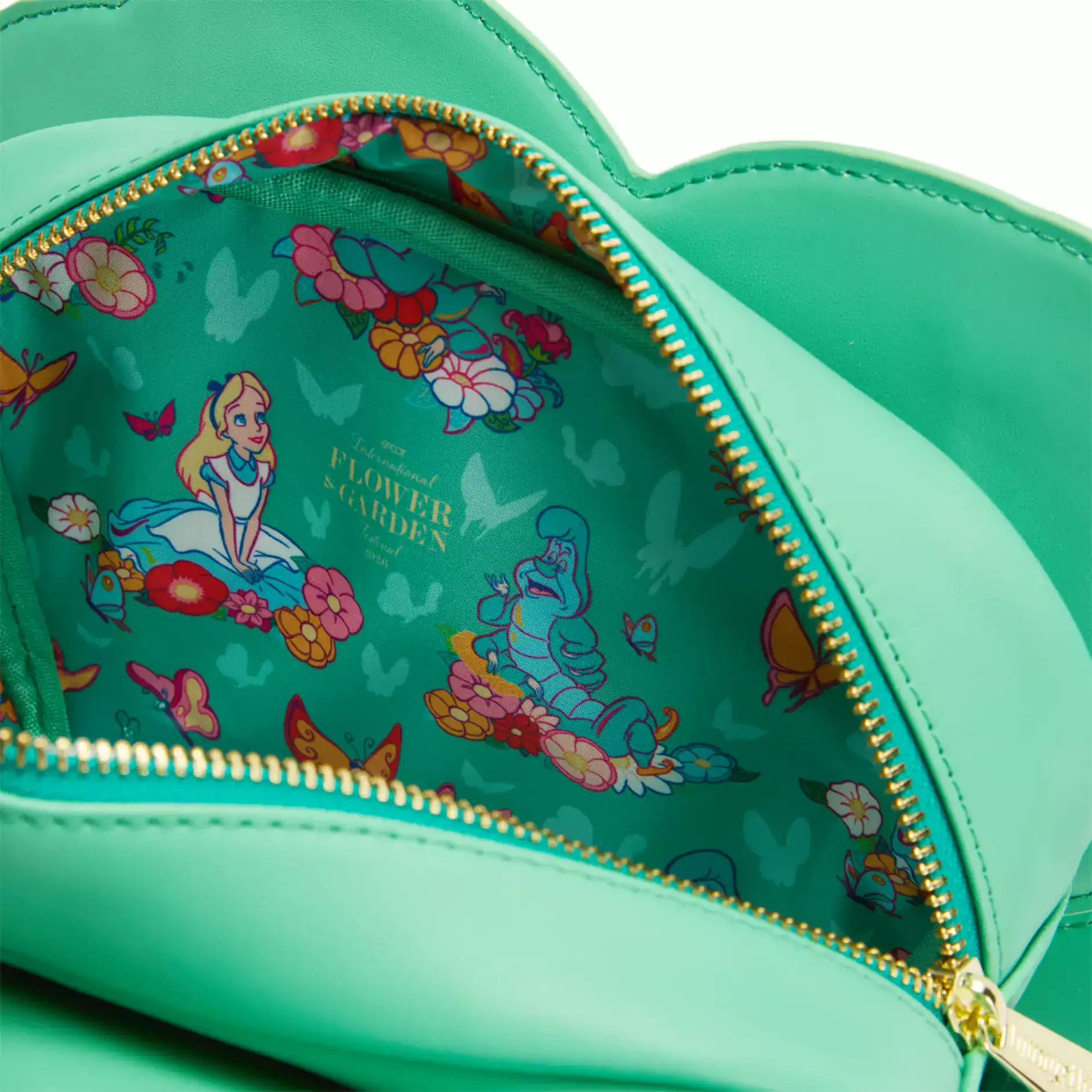 interior of the crossbody features Alice in Wonderland print 
