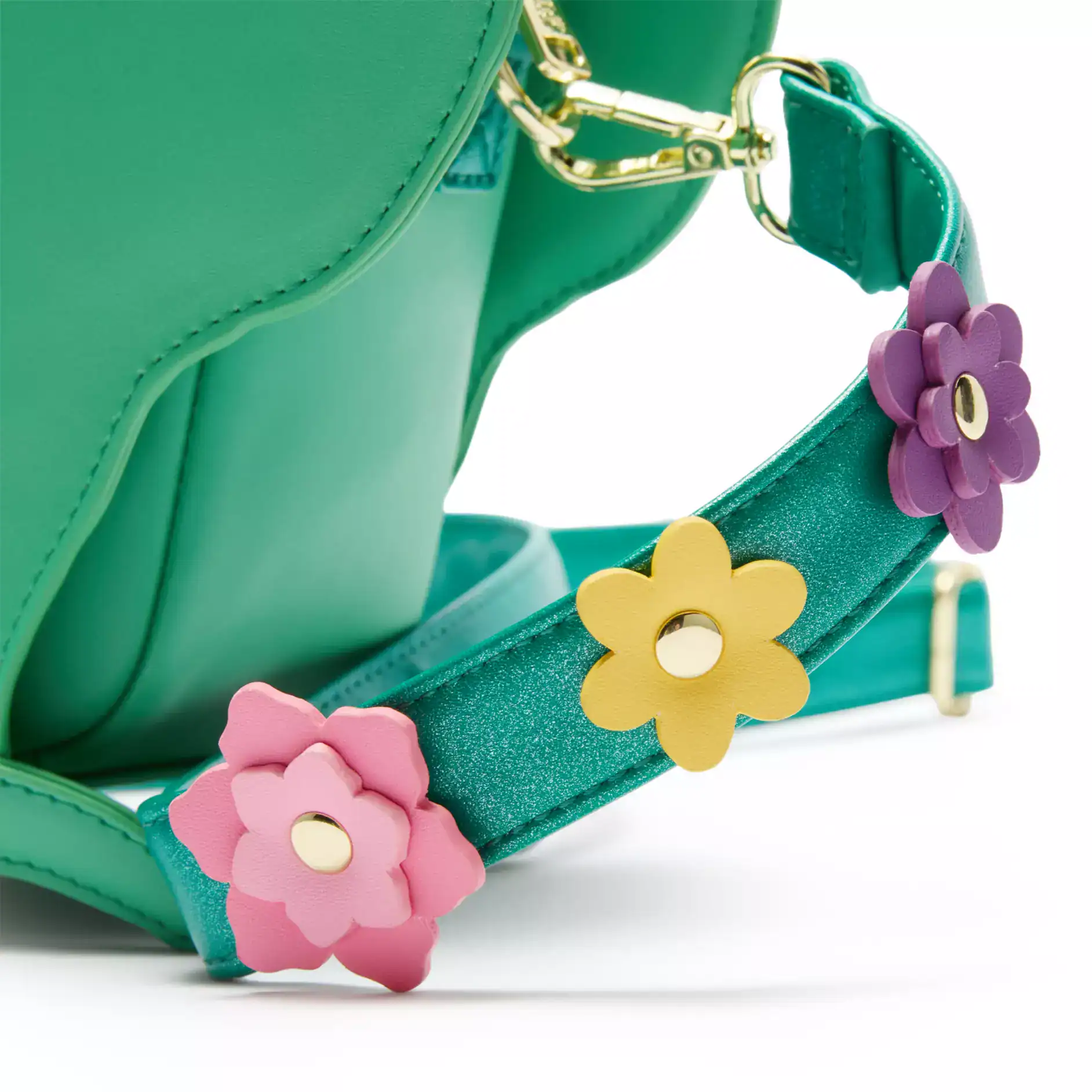 pink, yellow, and purple flowers on the strap of the crossbody 