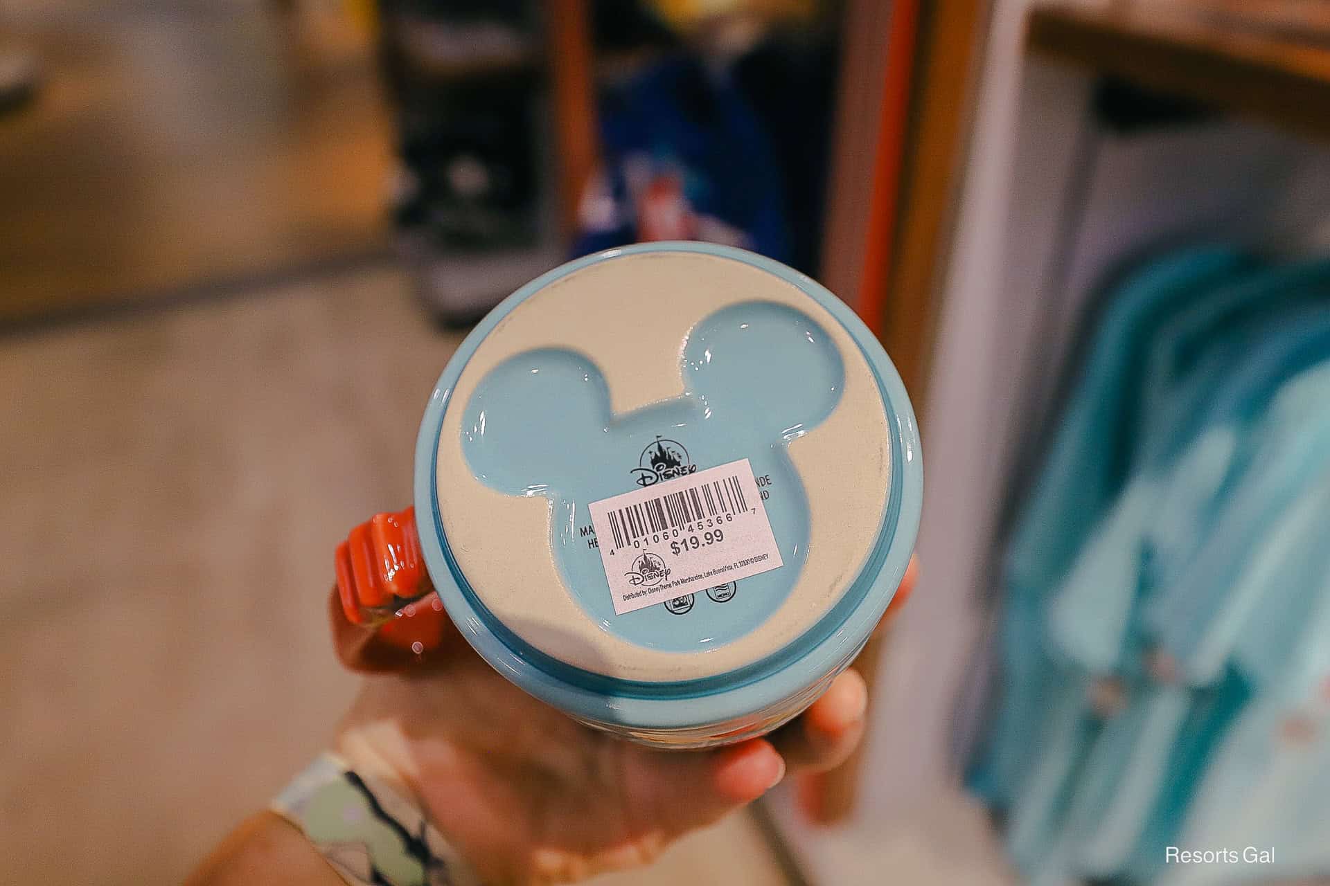 shows the Mickey shape on the bottom of the coffee mug for the All-Stars 