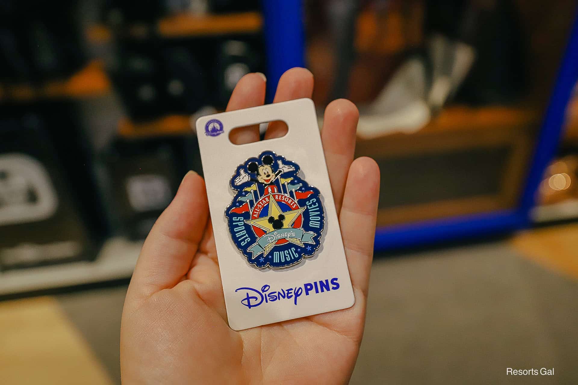 a pin with Disney's All-Star Resort logo 
