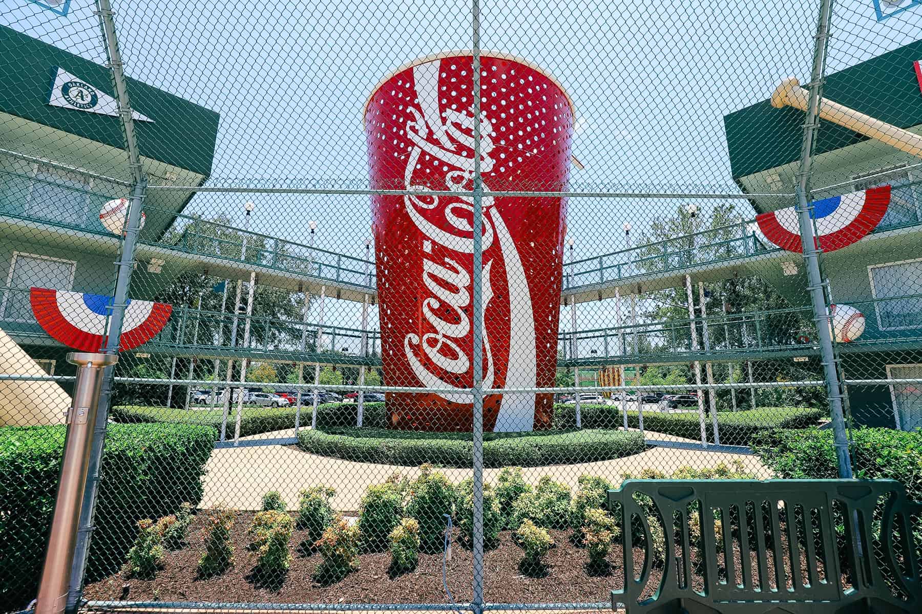 the stands surround the pool at All-Star Sports with a giant Coca-Cola cup staircase 
