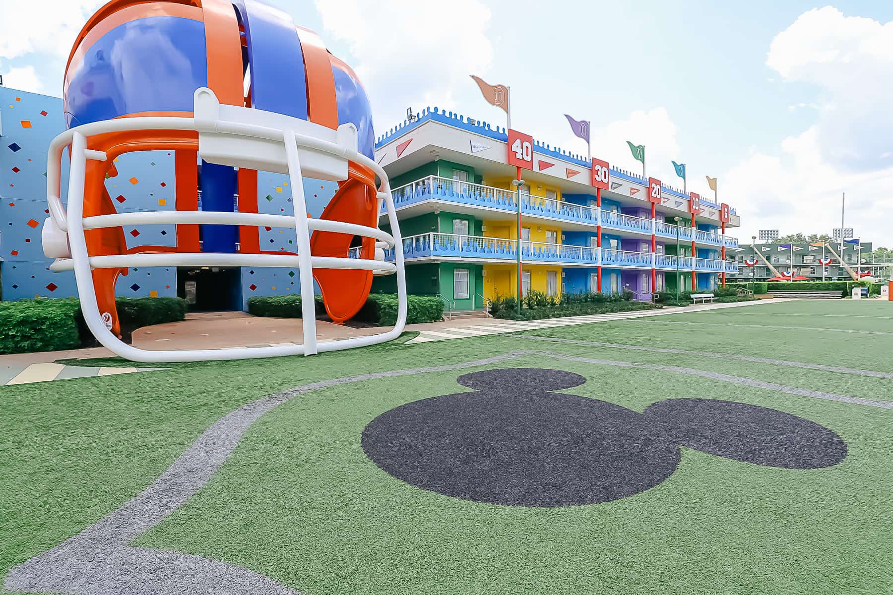 The football field with a giant helmet at Disney's All-Star Sports.