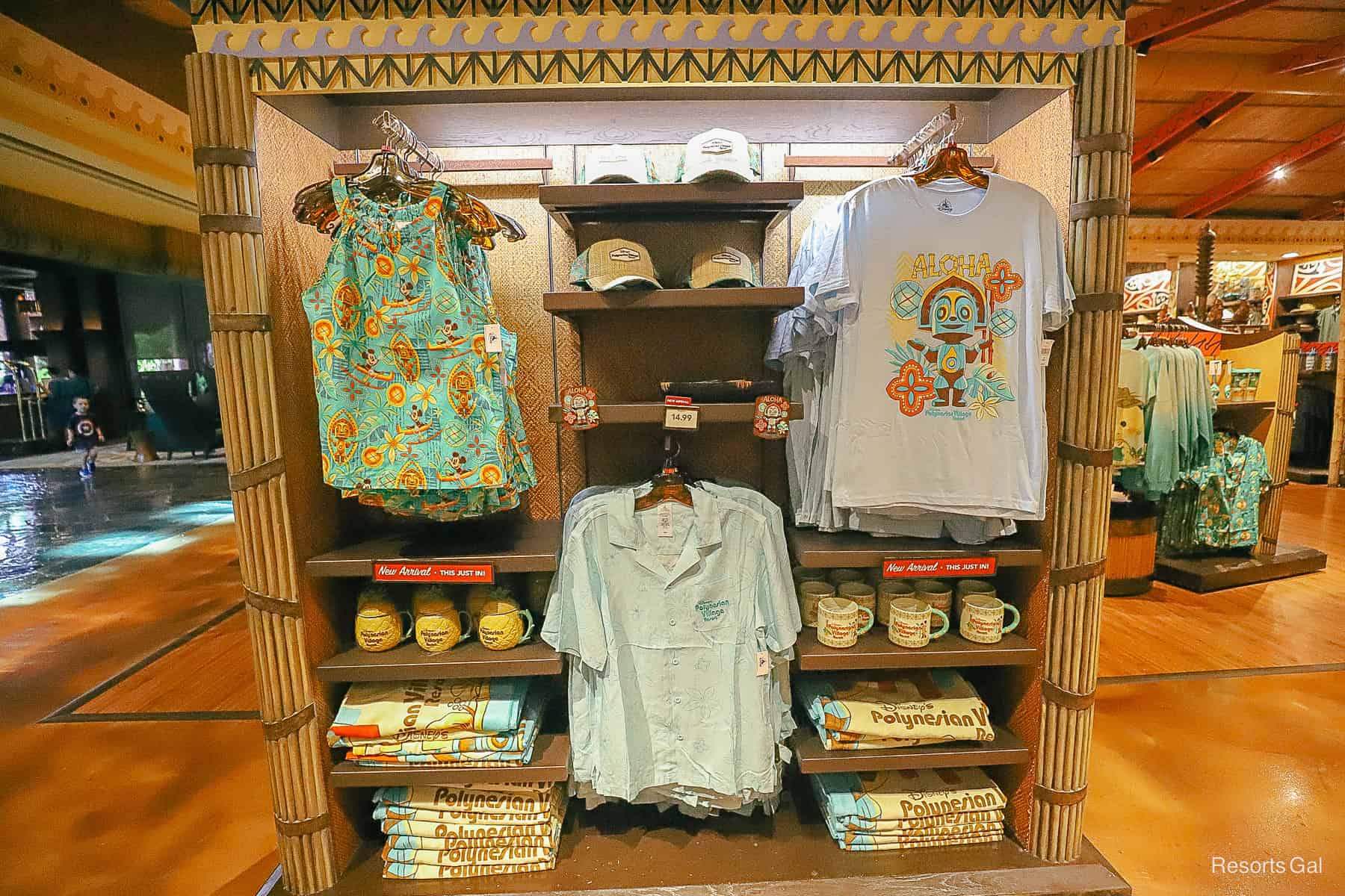 a display featuring various Disney Polynesian Village Resort branded merchandise 