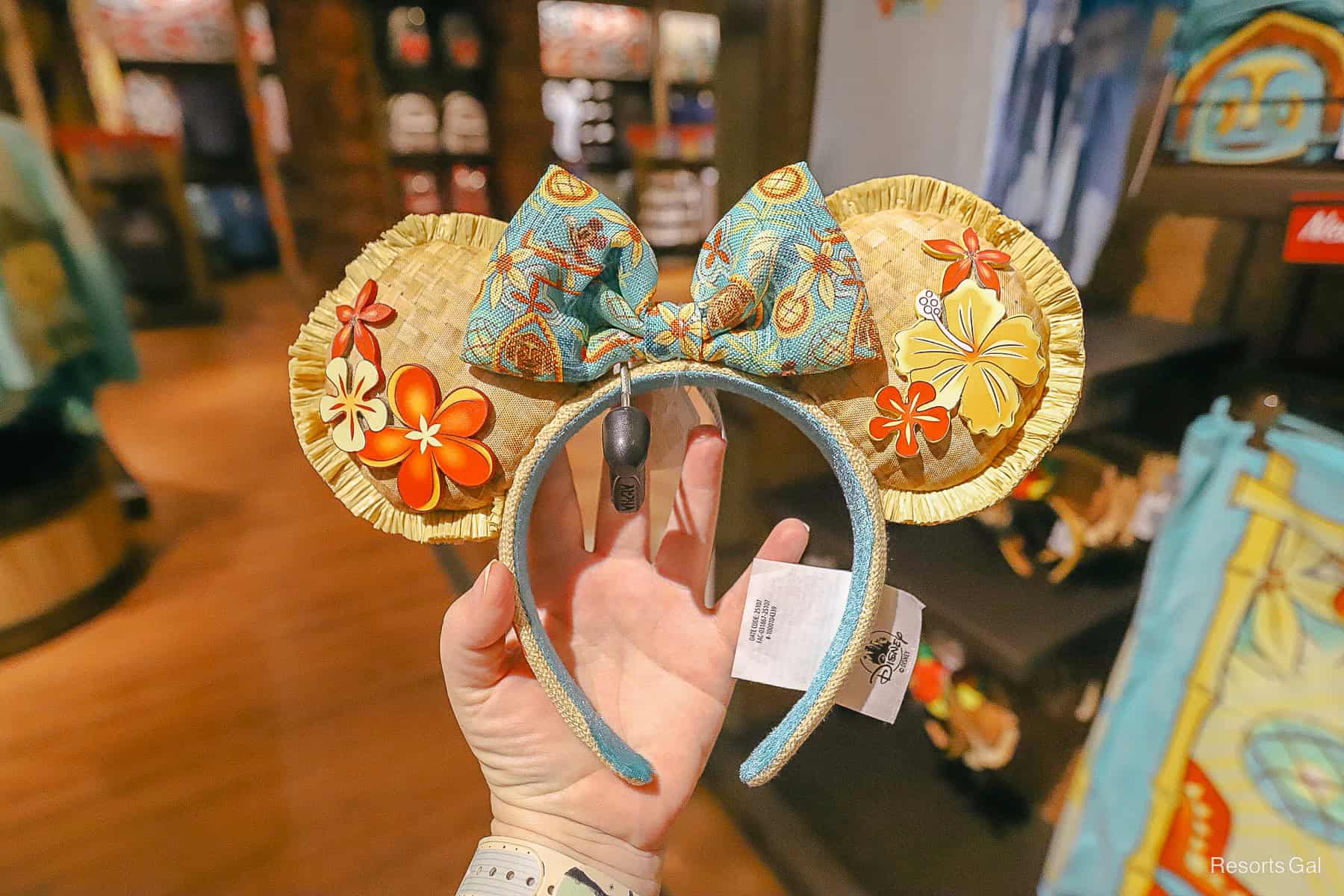a pair of Minnie ears with a straw look and tropical bow 