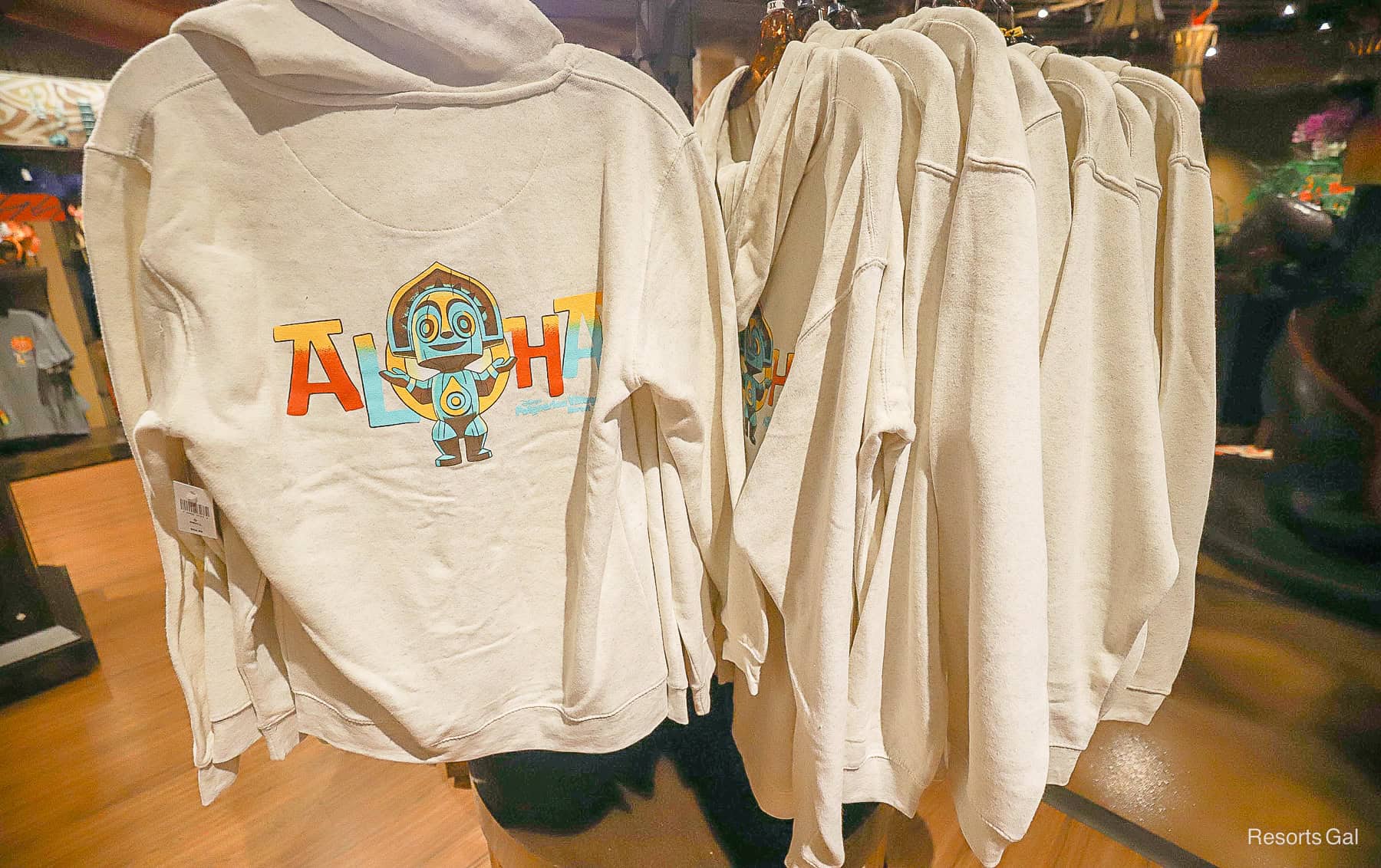 the back side of the Polynesian Resort zip up hoodie with the Aloha statue 