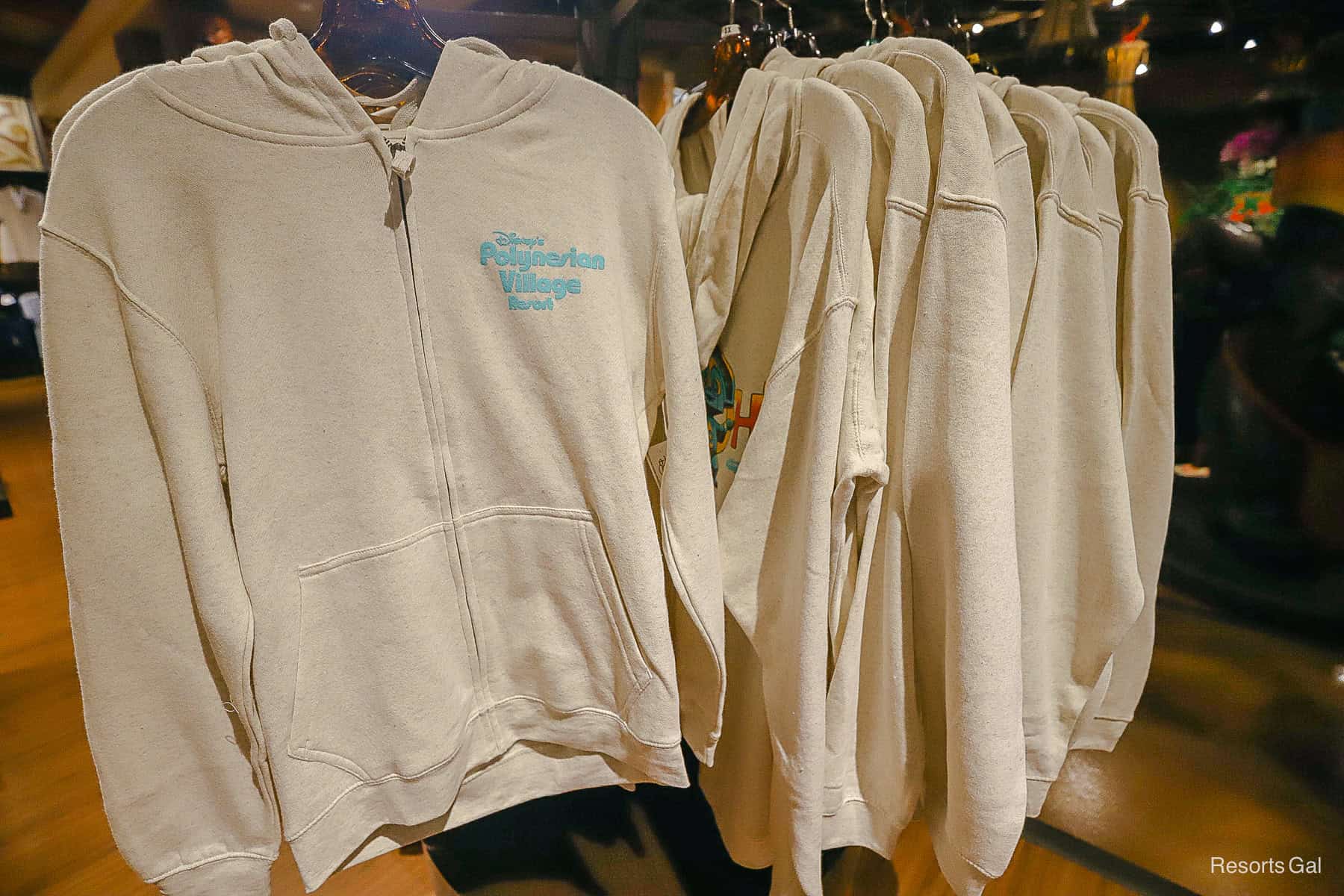 a long sleeve pullover with the logo for Disney's Polynesian, front side 