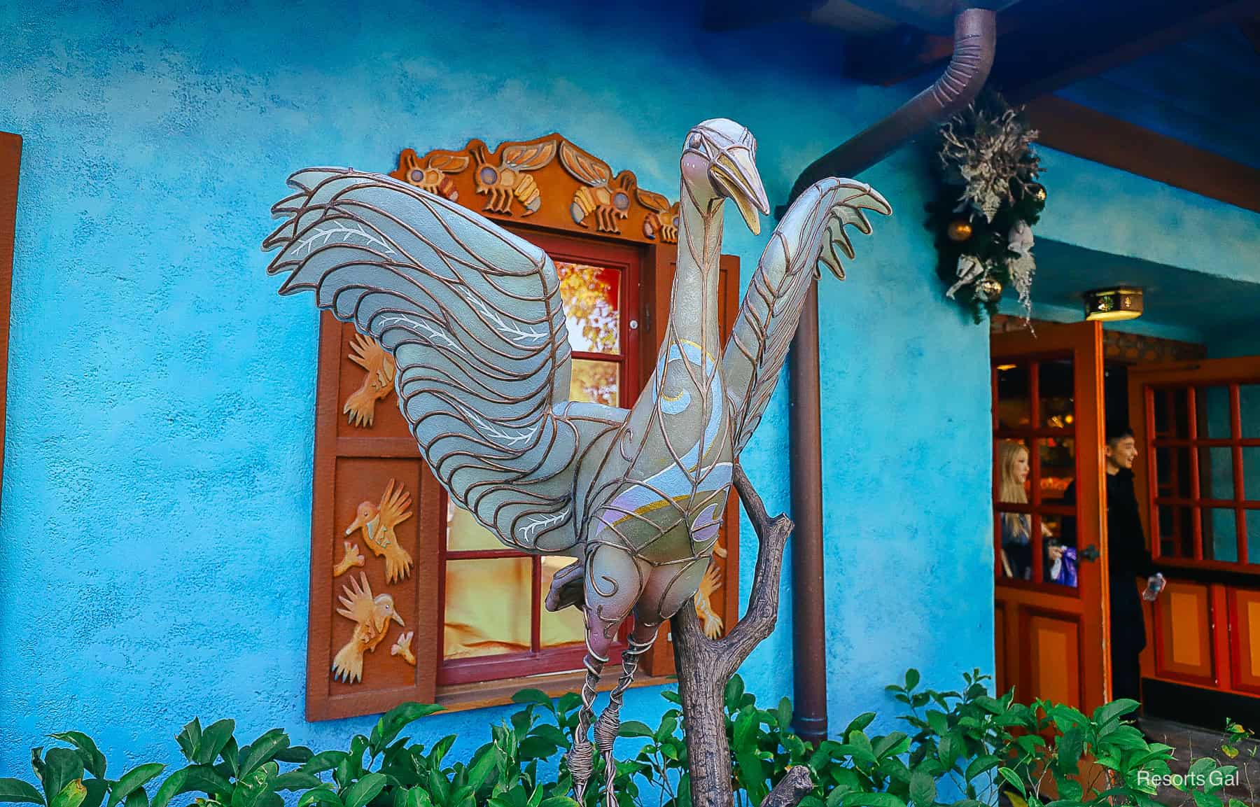 a glass crane that lights up at night