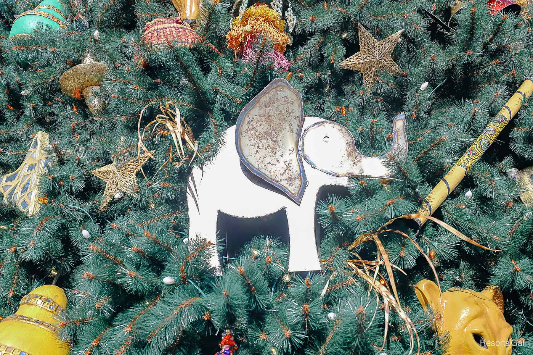 an elephant ornament on the Christmas tree