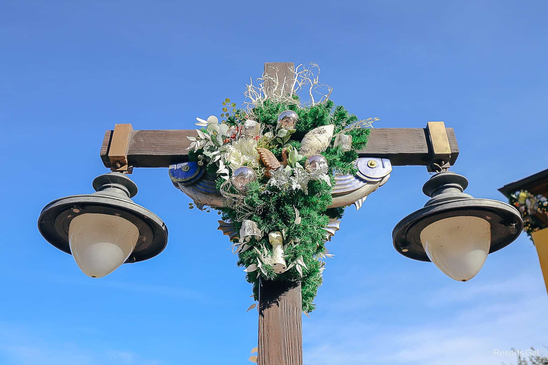 a lamp post with fish and bunches of garland at Disney's Animal Kingdom