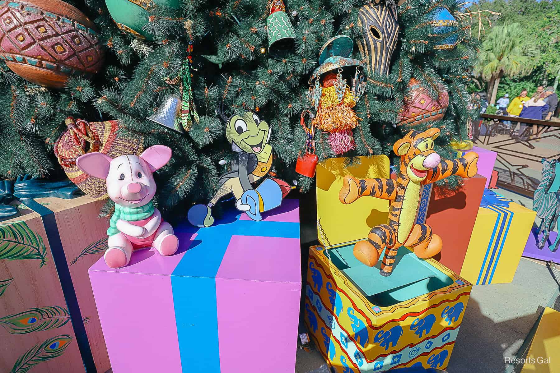 toys and packages under the Christmas tree at Disney's Animal Kingdom