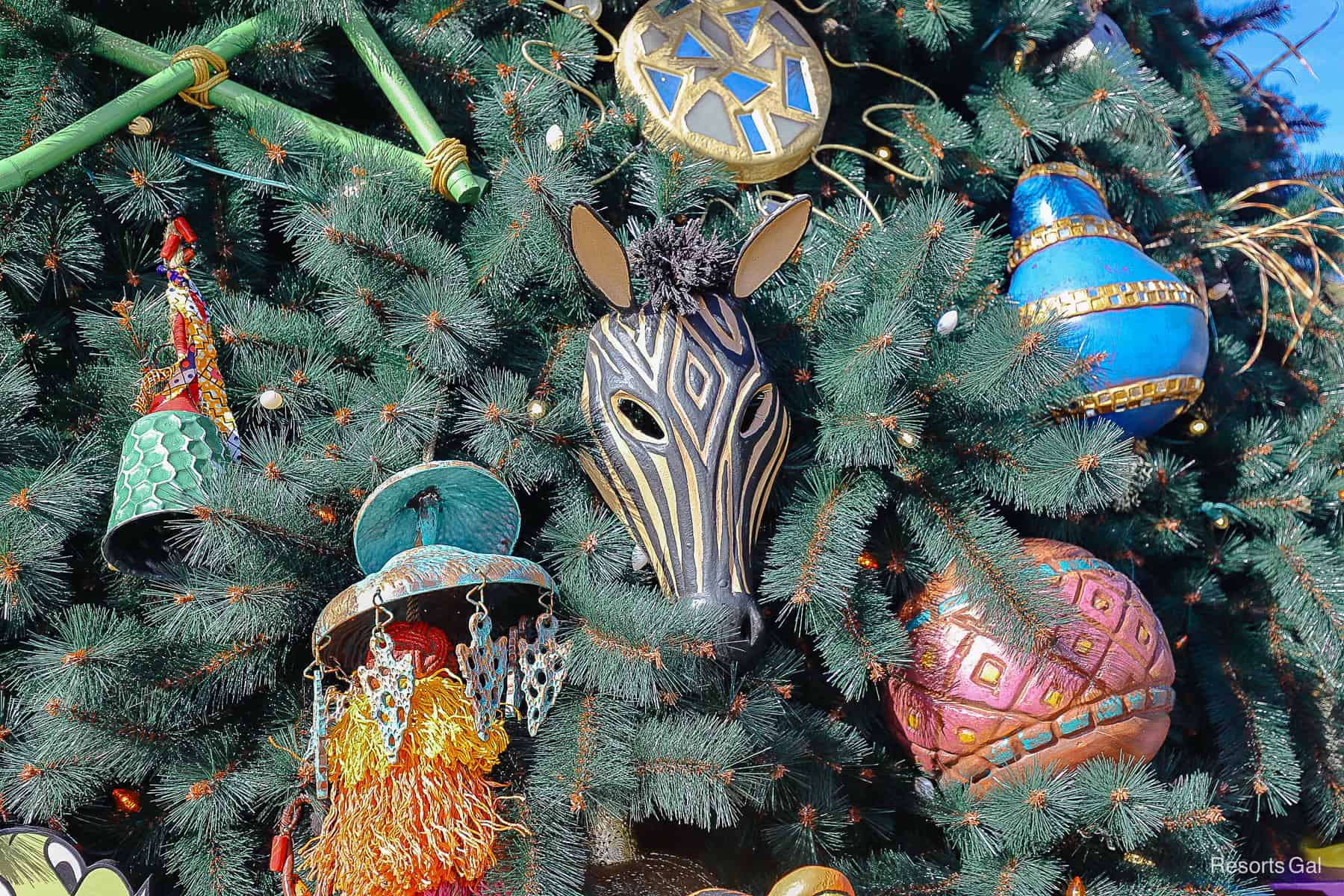 a closeup of a zebra mask on the Christmas tree