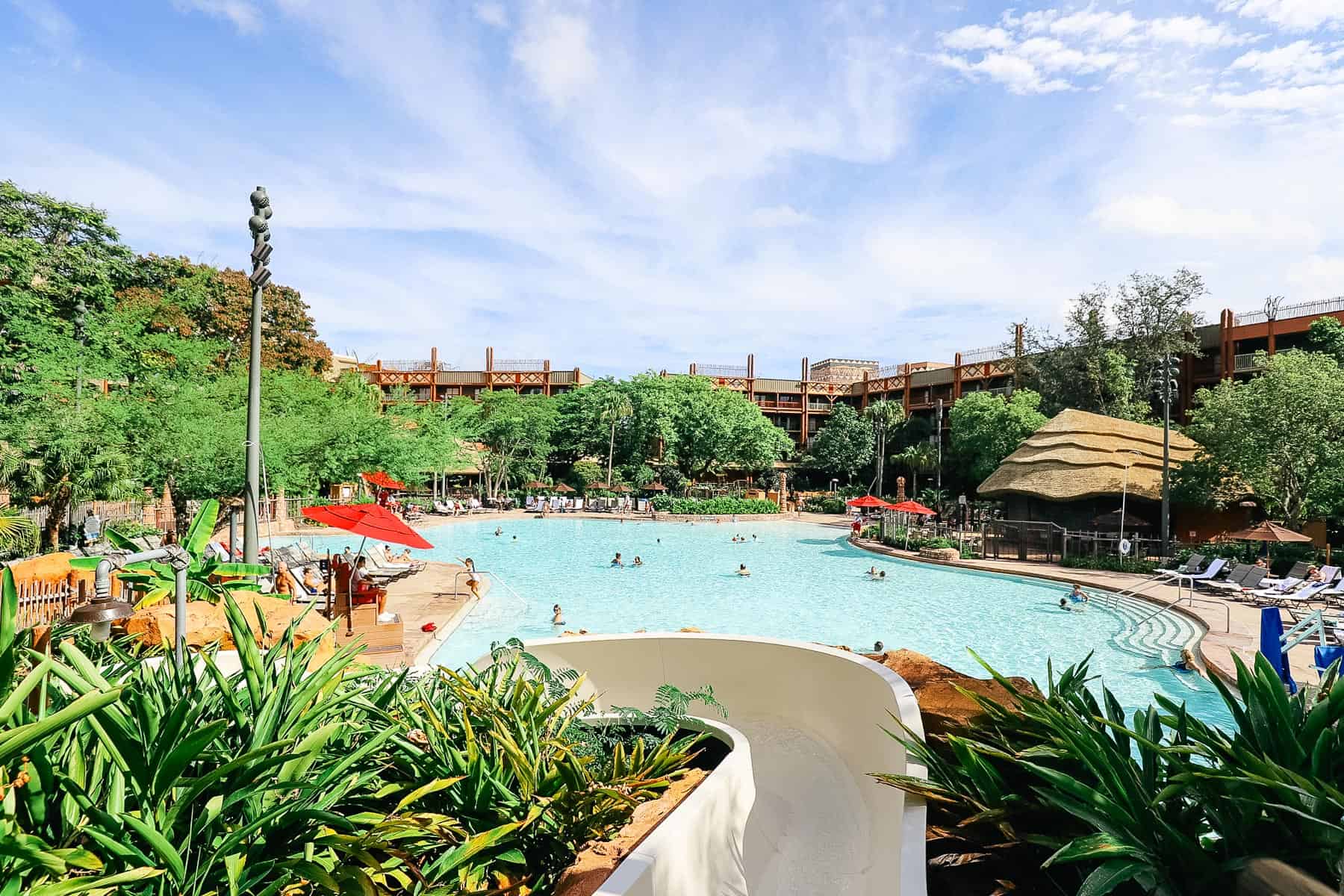 the waterslide entering the pool at Jambo House 