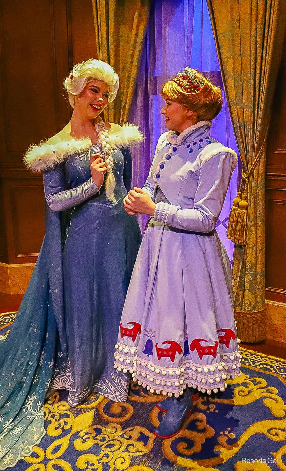 vertical image of Elsa on the left and Anna on the right 