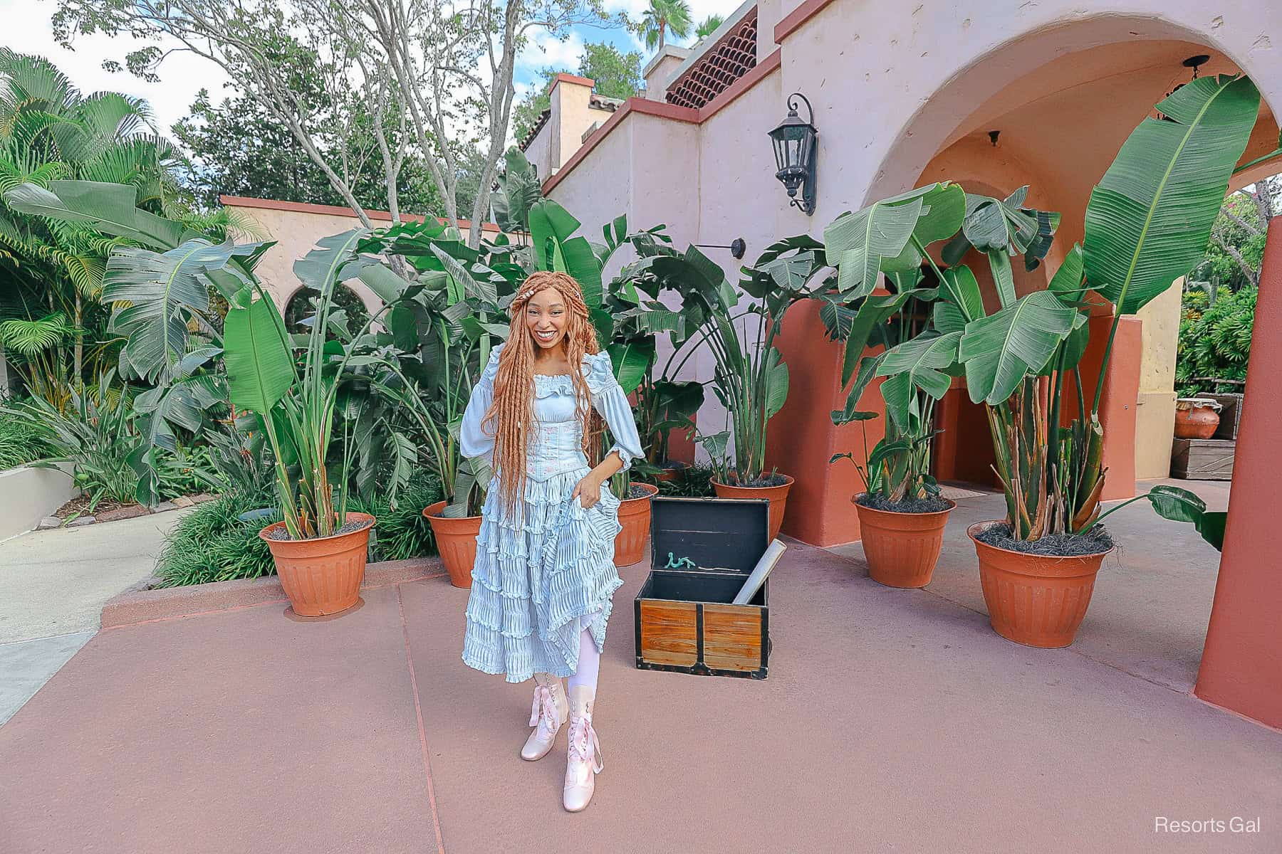 Ariel shows off her pink land boots