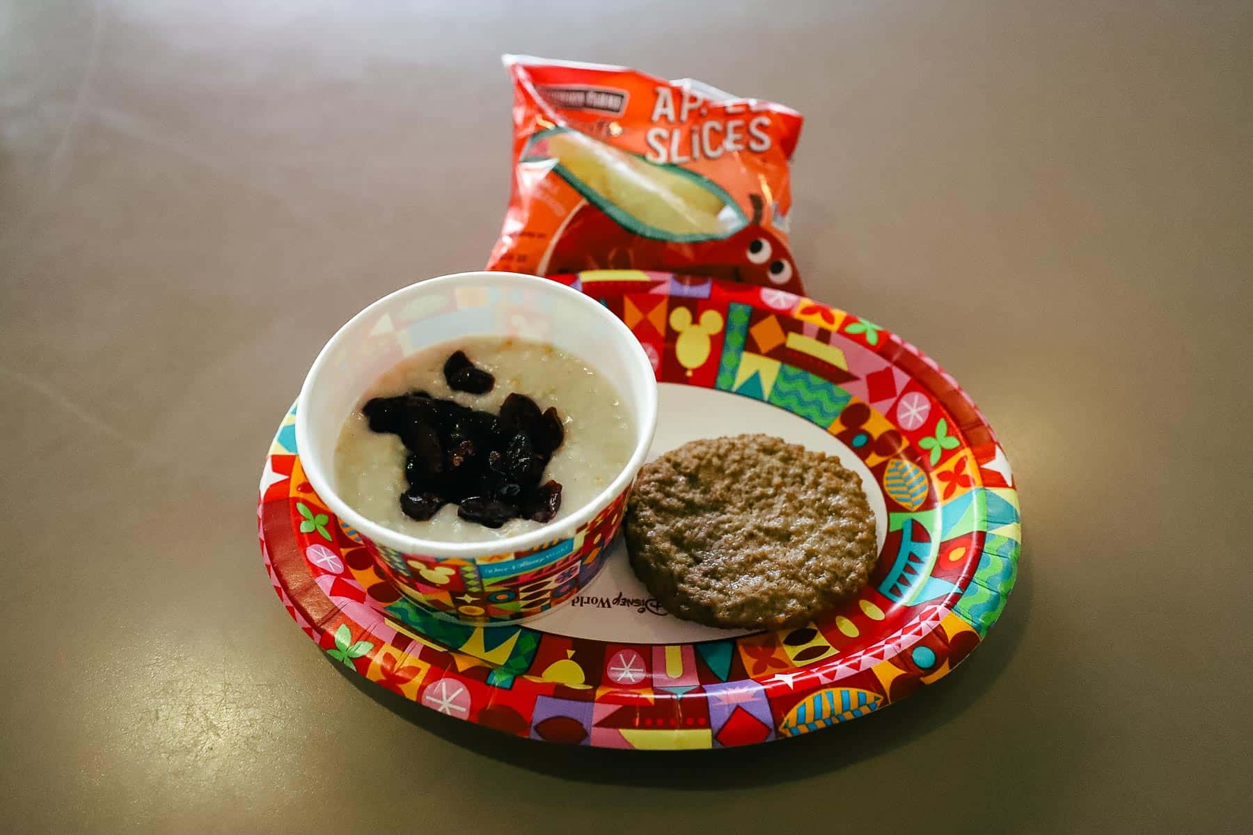 a breakfast plate with oatmeal and turkey sausage 