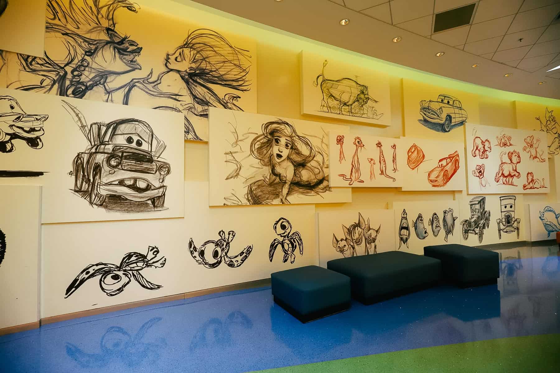 sketch drawings in pencil and ink in the lobby of Art of Animation 