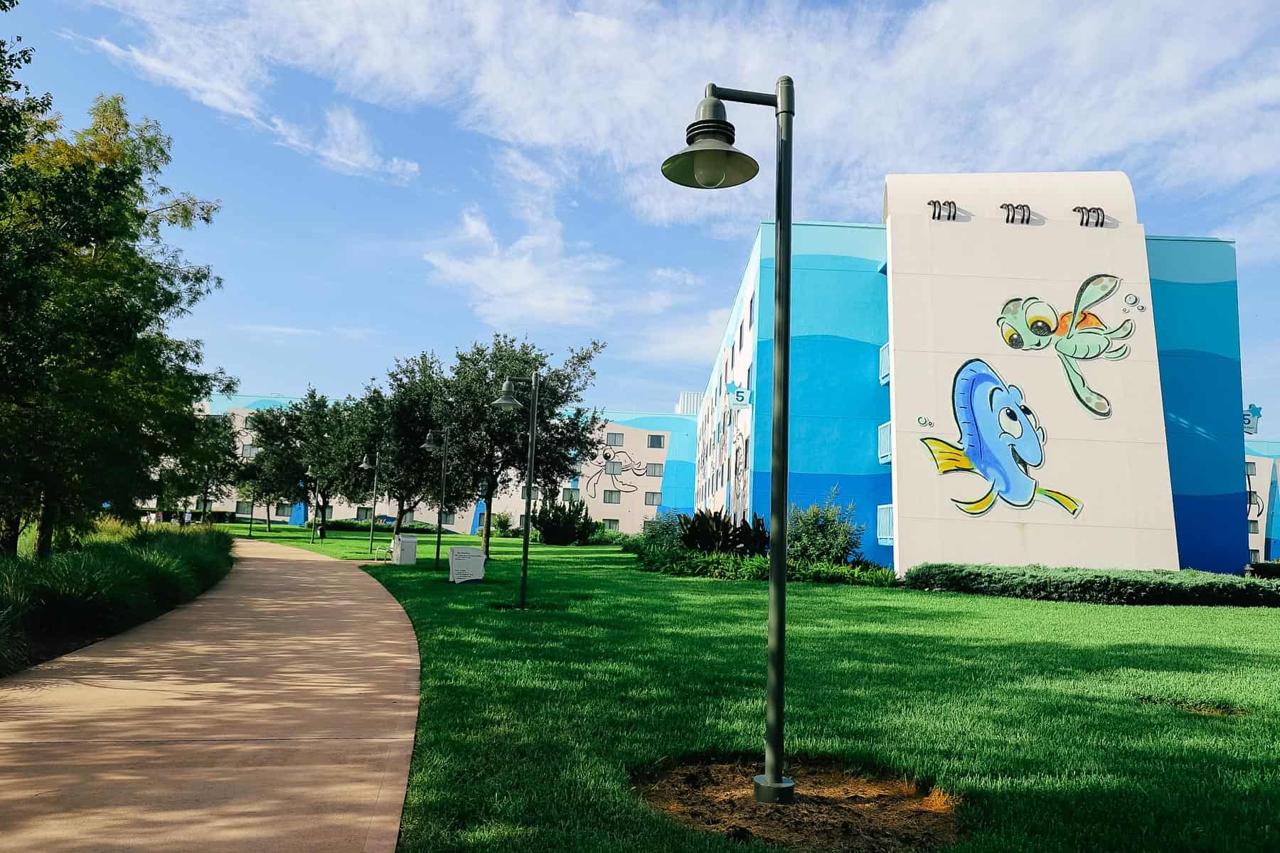 Squirt and Dory as a finished sketch on the side of the staircase of Art of Animation. 