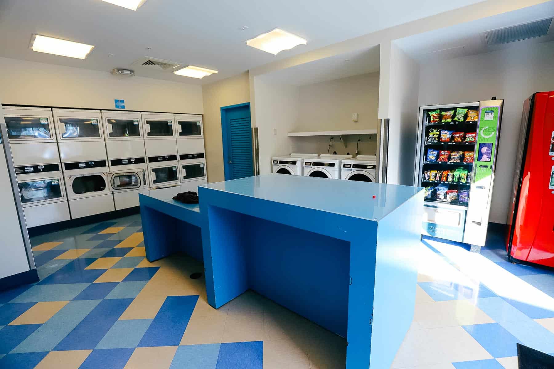 washers and dryers in the laundry room at Art of Animation 