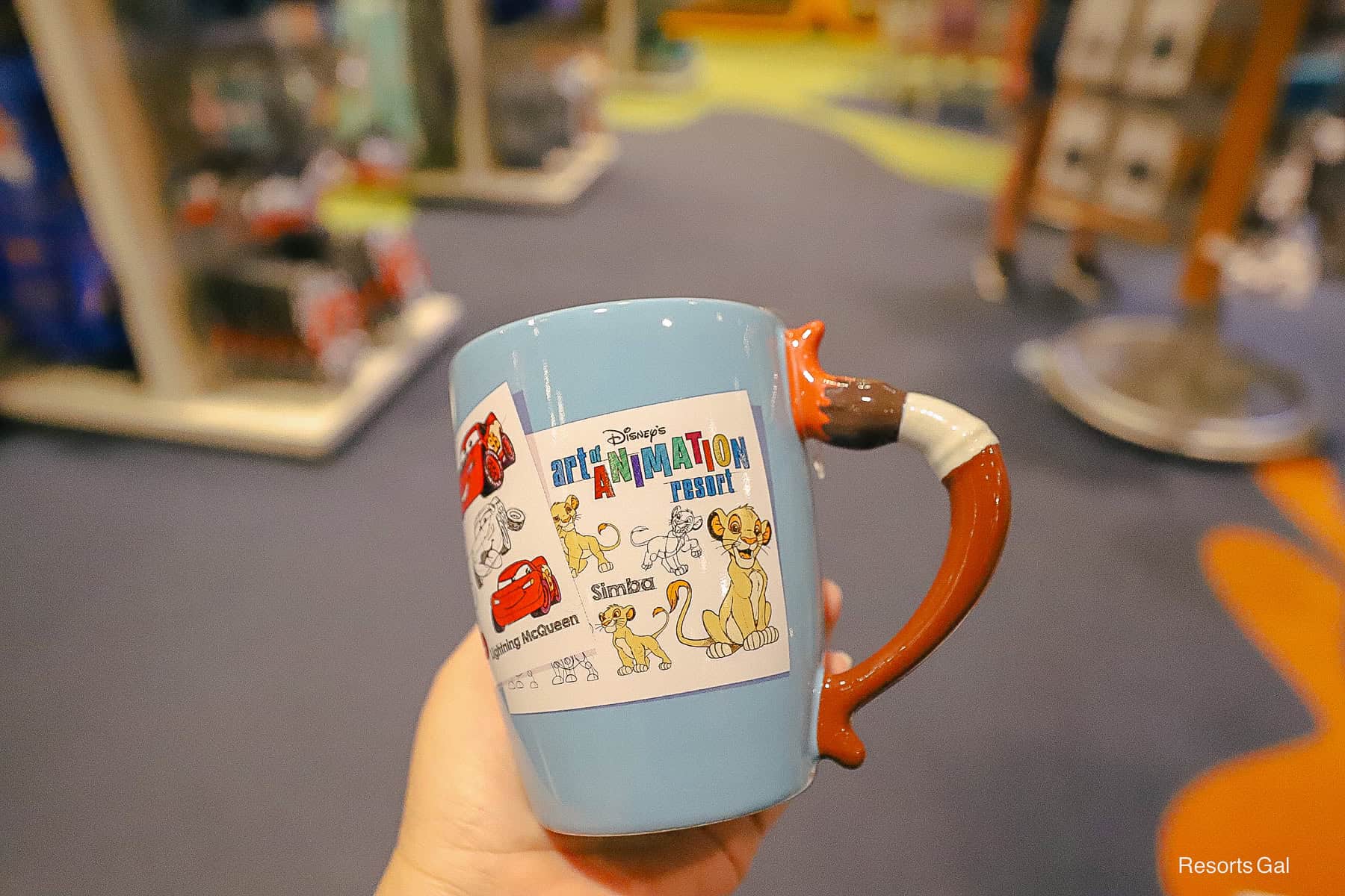 back side of the mug with Cars and The Lion King 