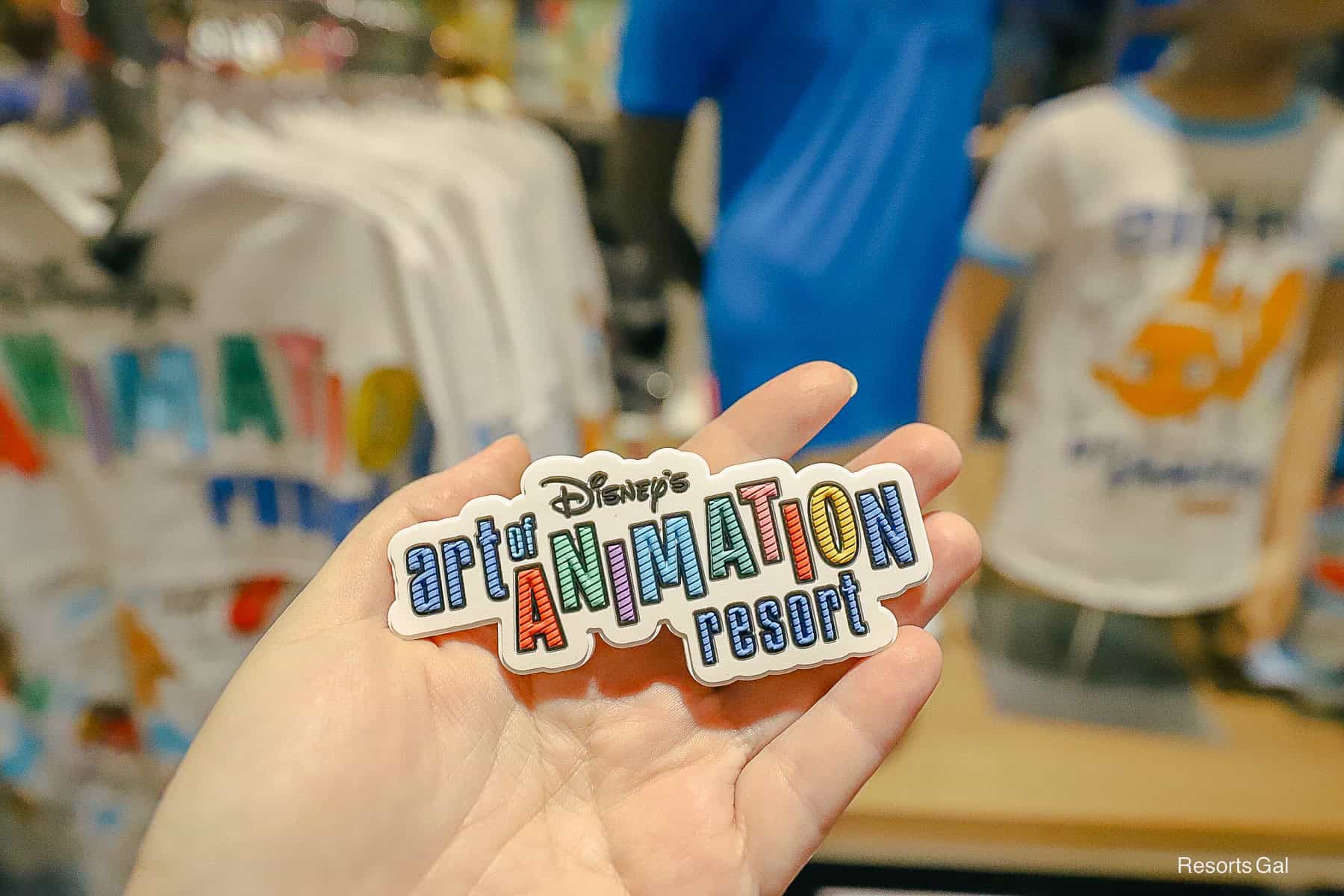 a small Art of Animation Resort magnet 