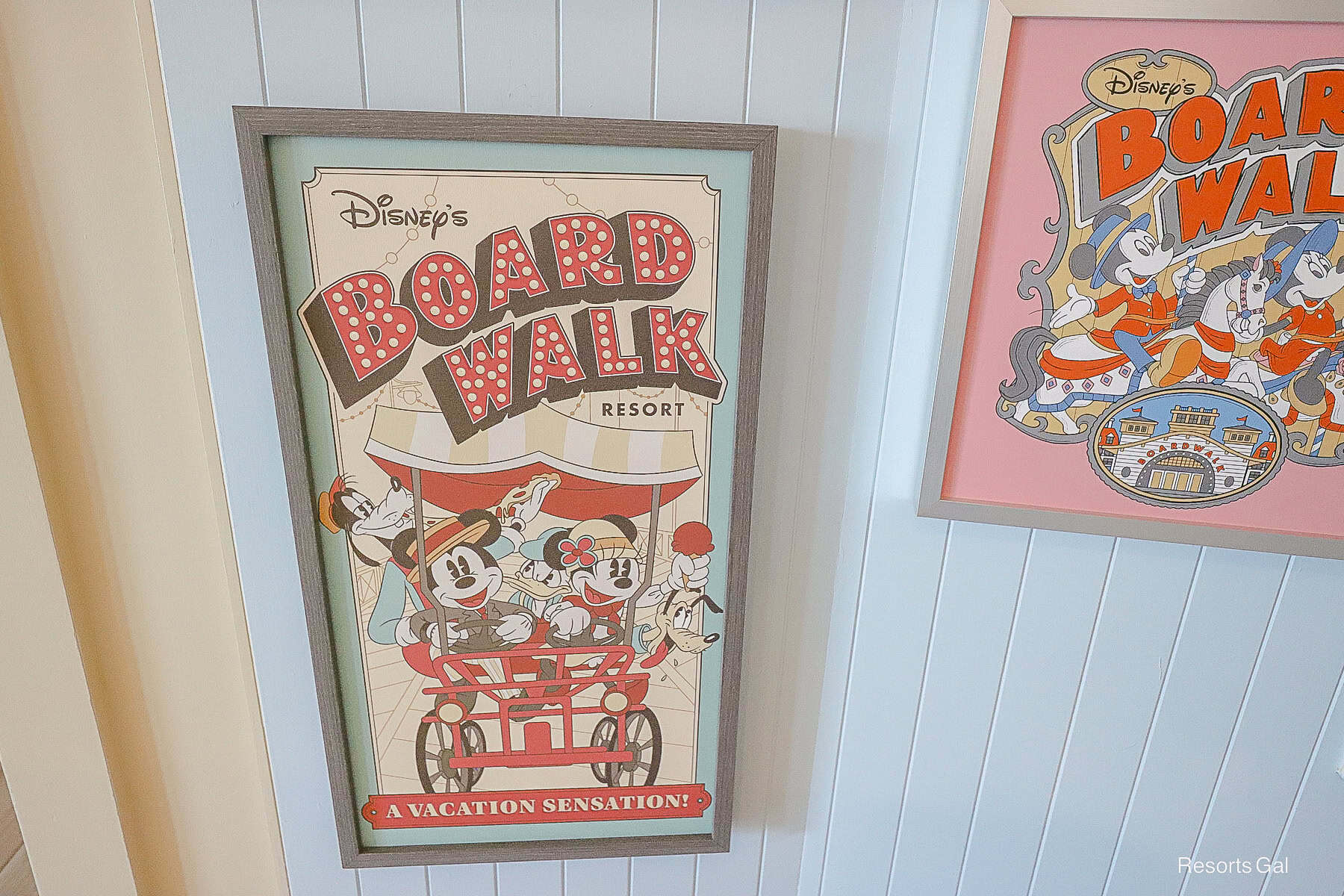 a yellows and red piece of art with Mickey, Minnie, and Goofy