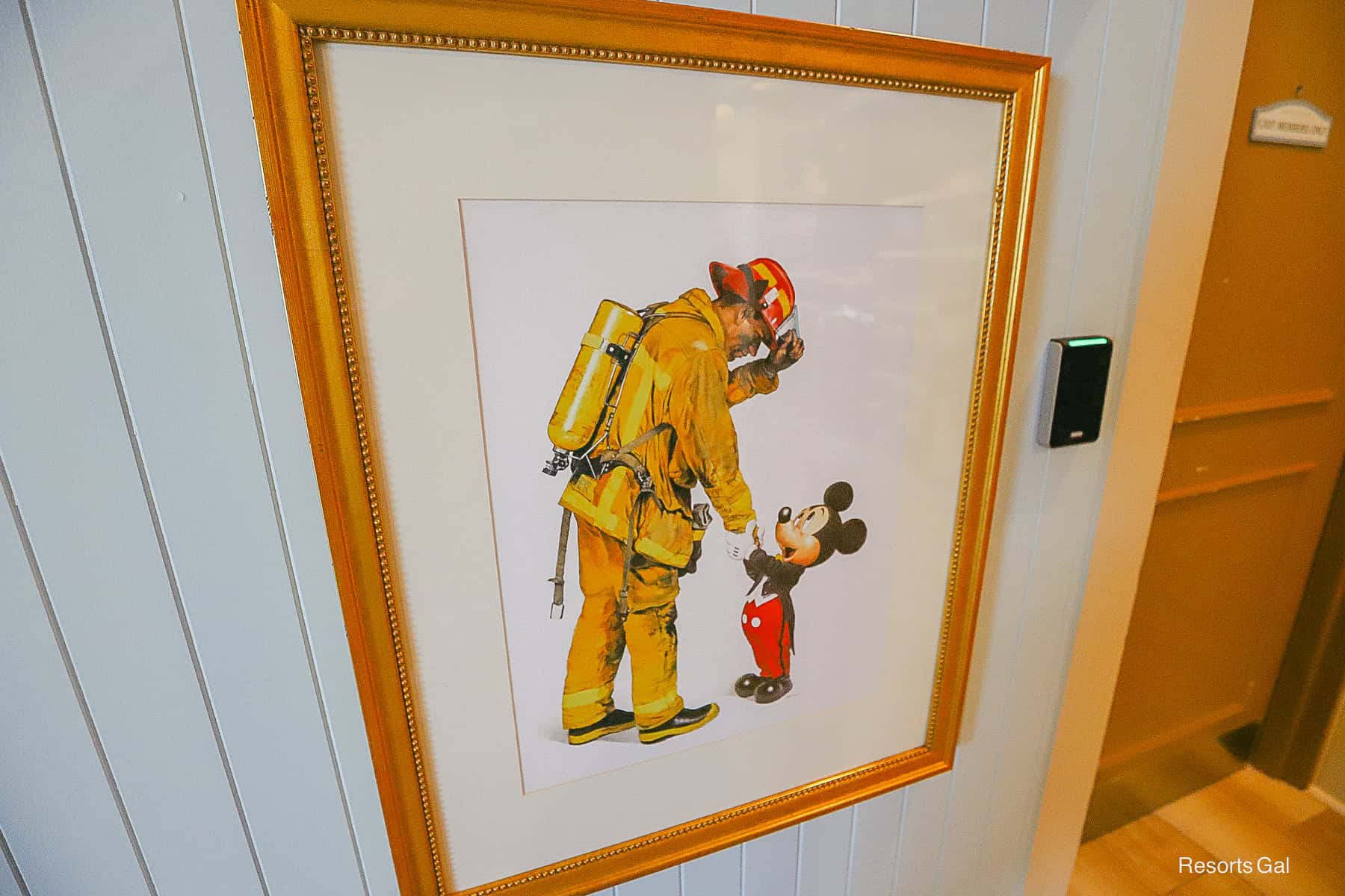 a fireman and Mickey Mouse piece of art