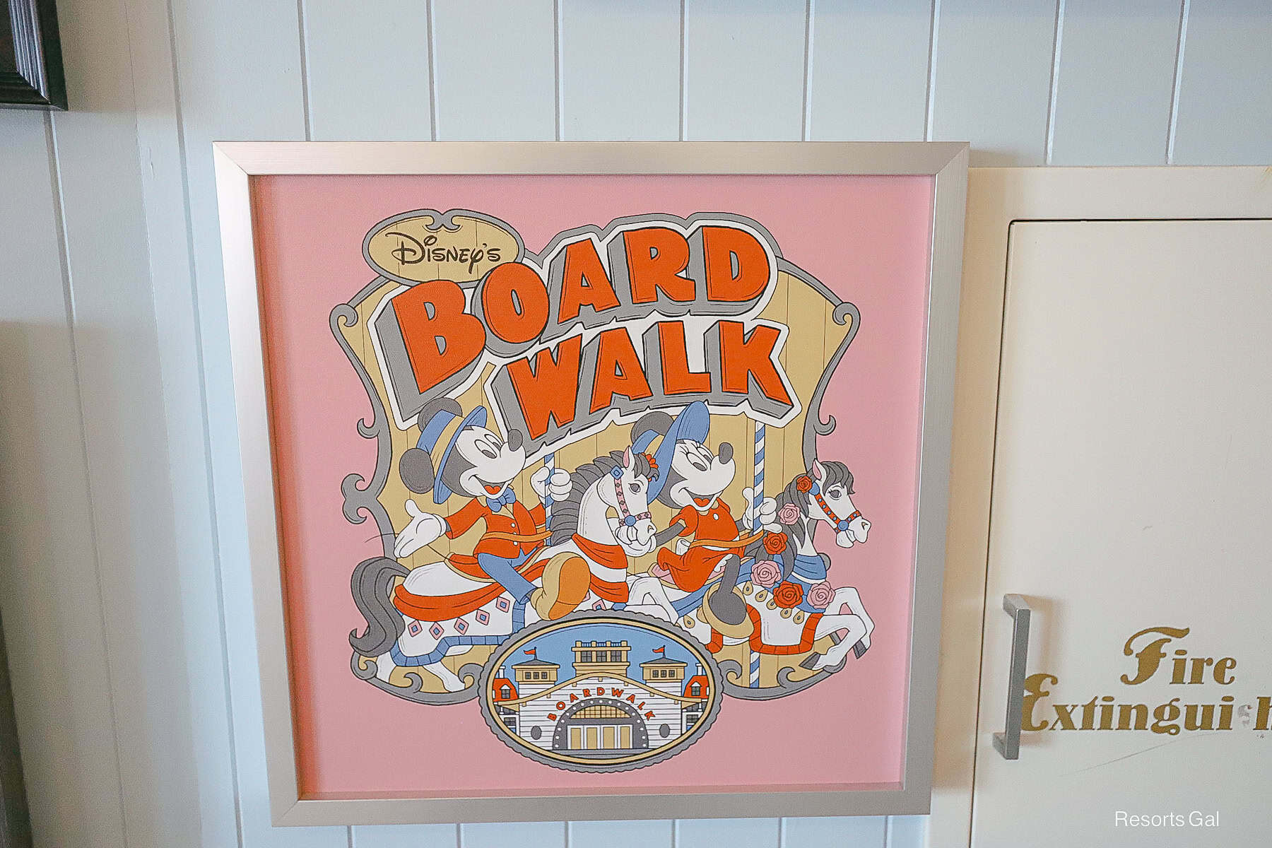 Mickey and Minnie Boardwalk Resort artwork in pink and red