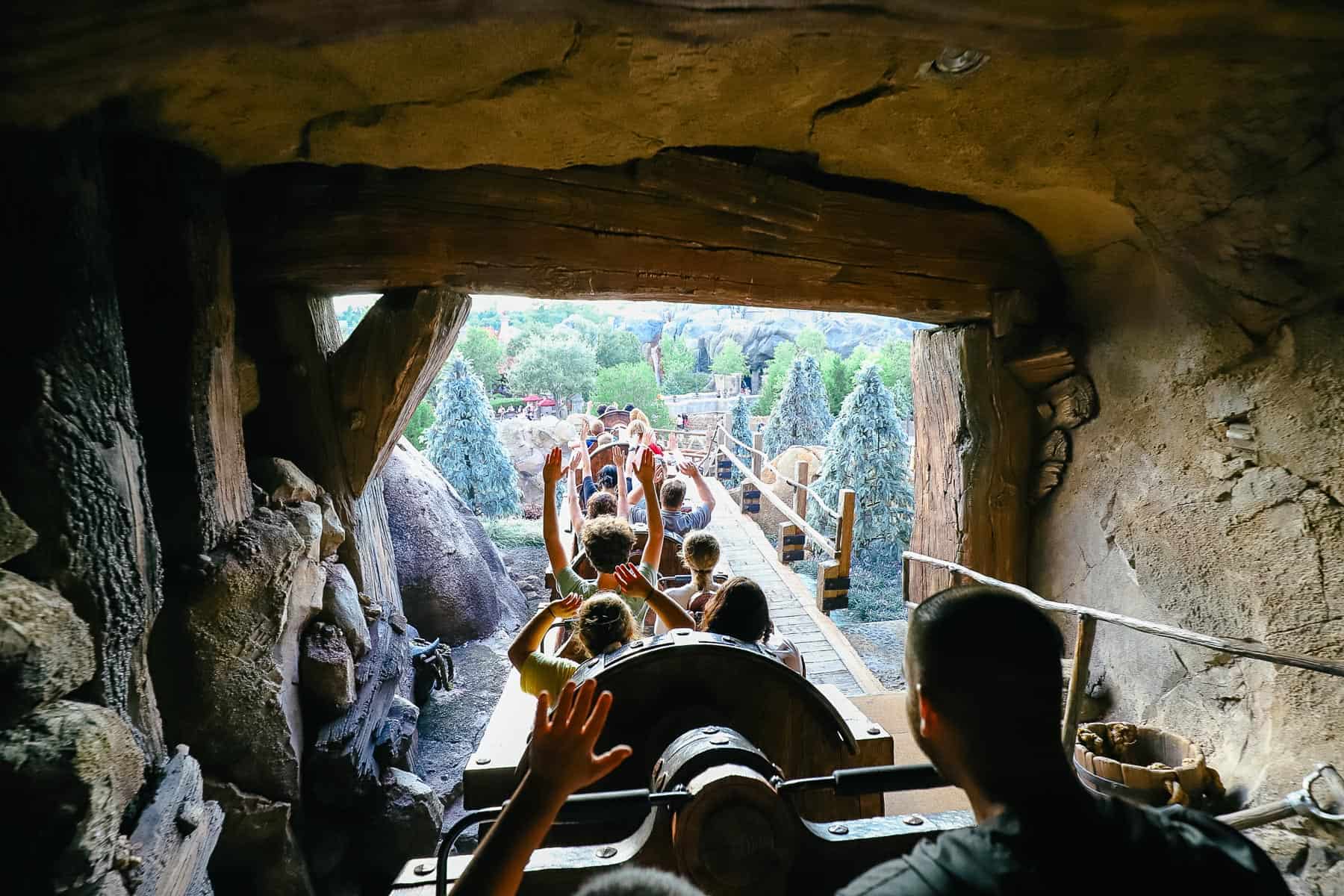 Guests on the coaster as it exits the mine. 
