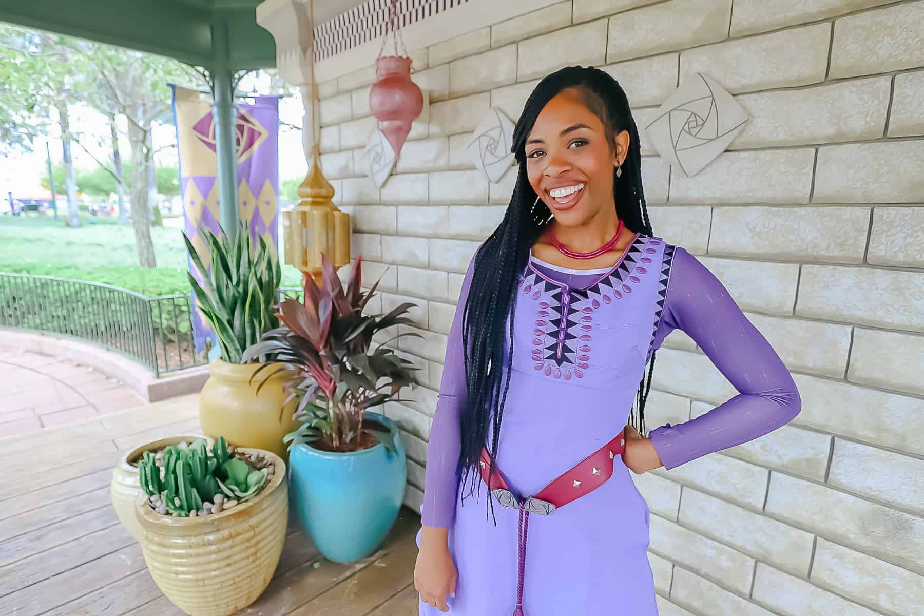 Asha wearing her purple dress. 