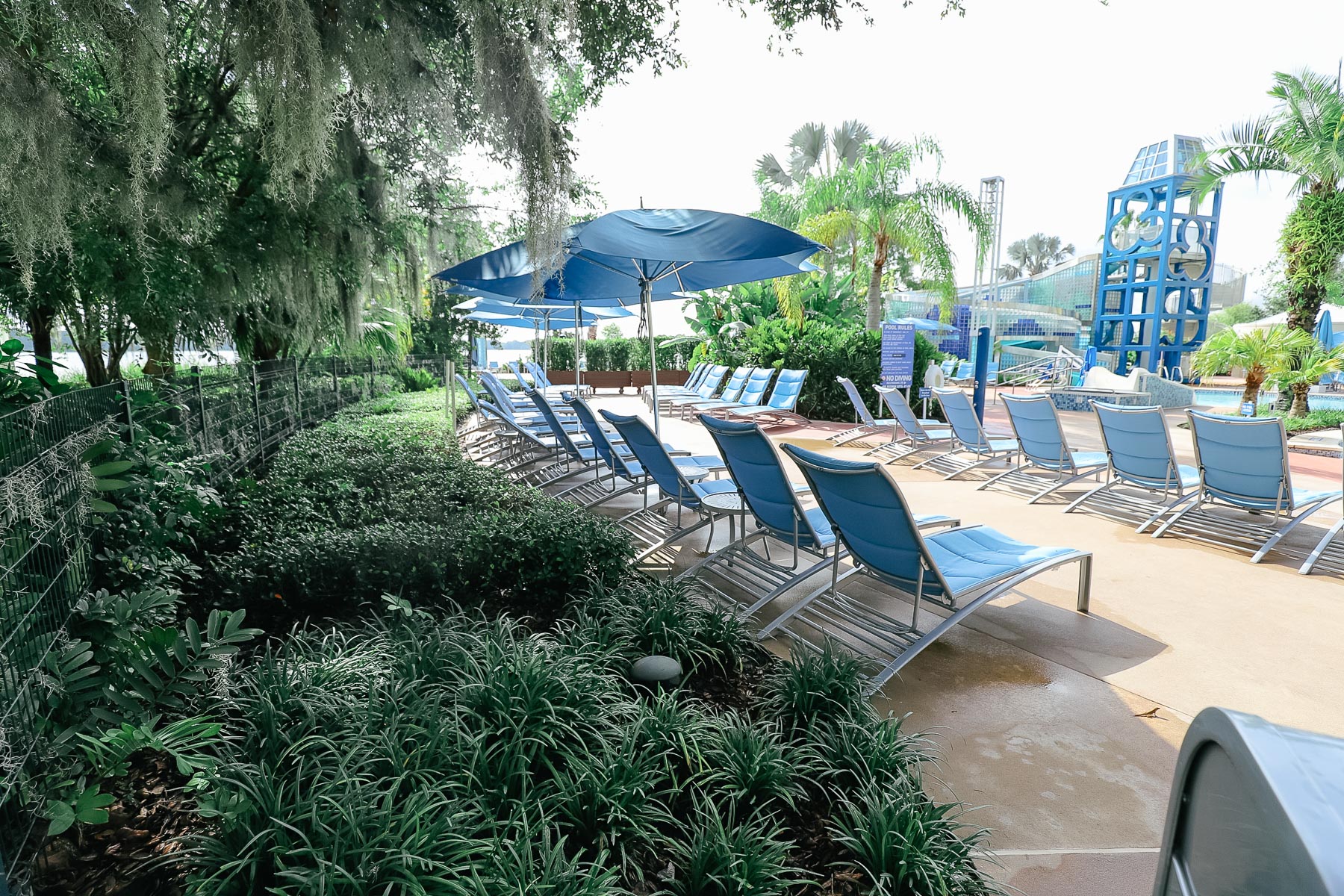 a shaded sitting area at the Bay Cove Tower Pool 
