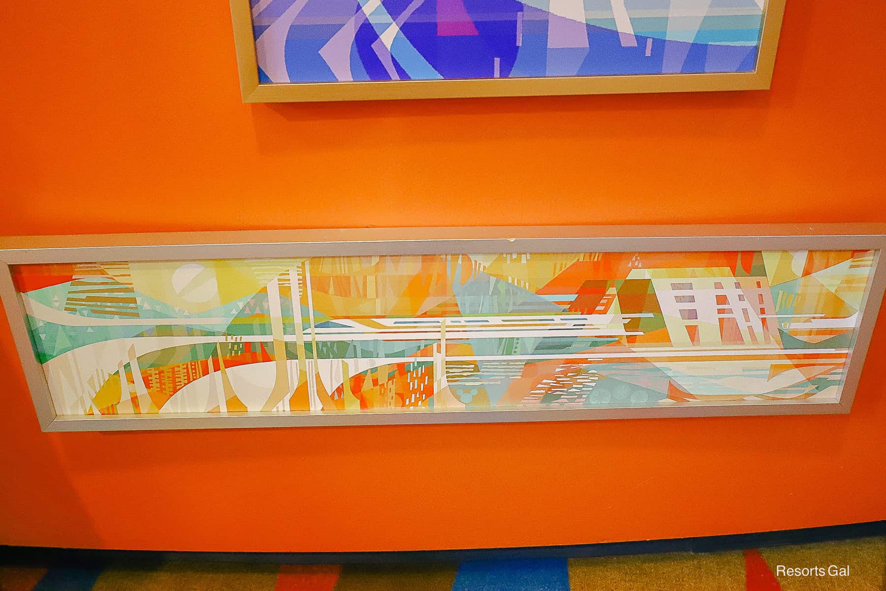 an art piece with the monorail going through the Contemporary