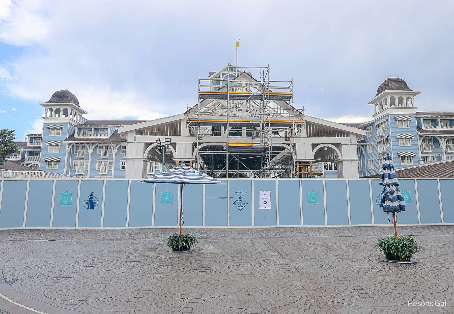 the entrance of Disney's Beach Club surrounded by a construction wall in August 2025