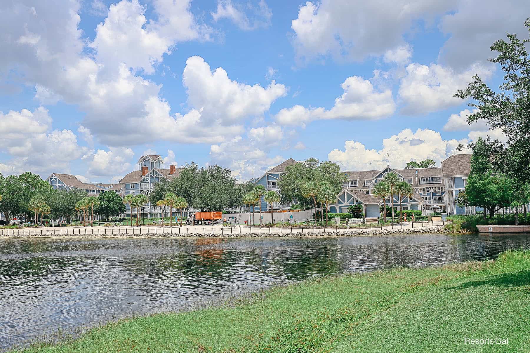 Disney's Beach Club with construction fence as seen from across the lake
