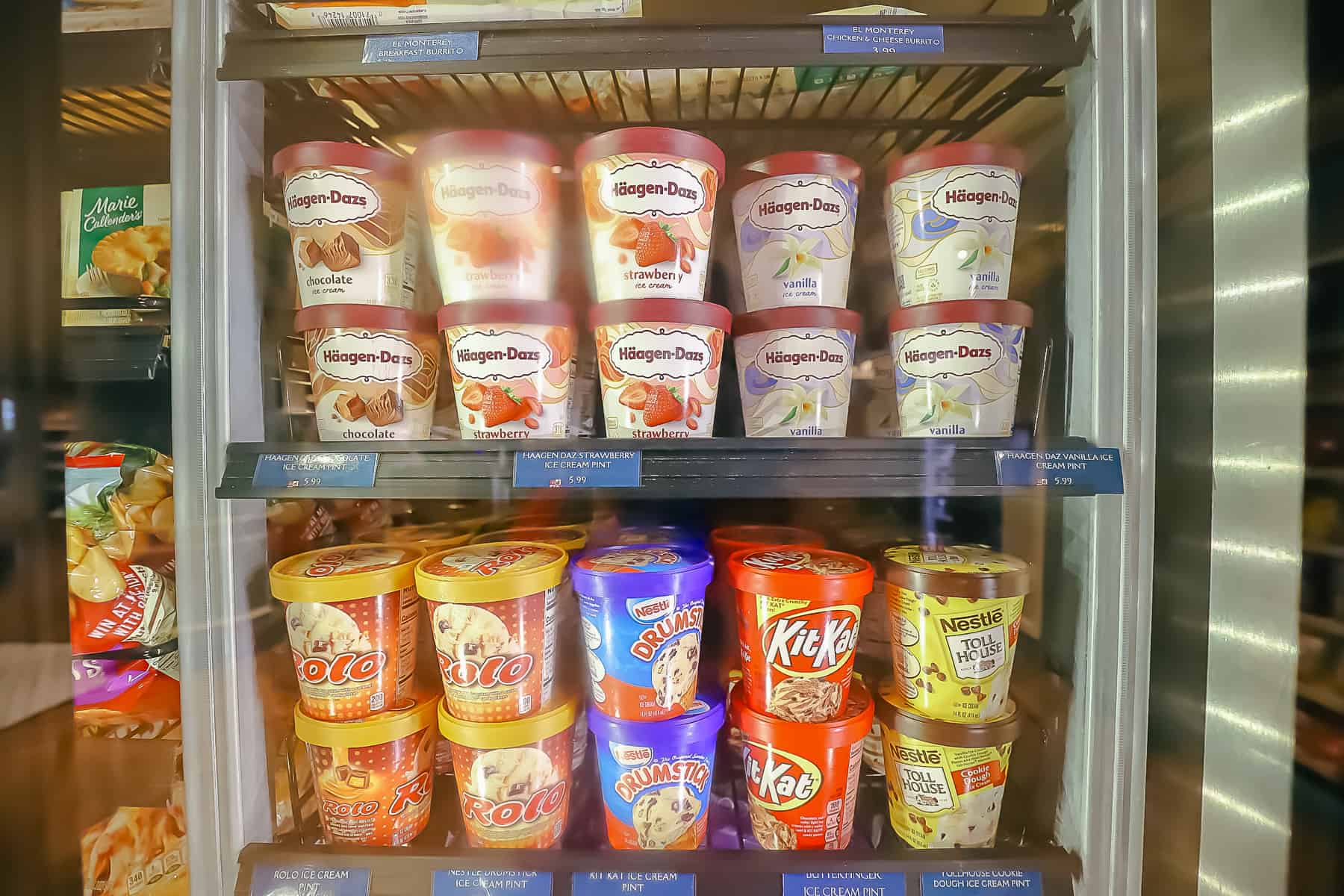 various ice creams in a refrigerated case 