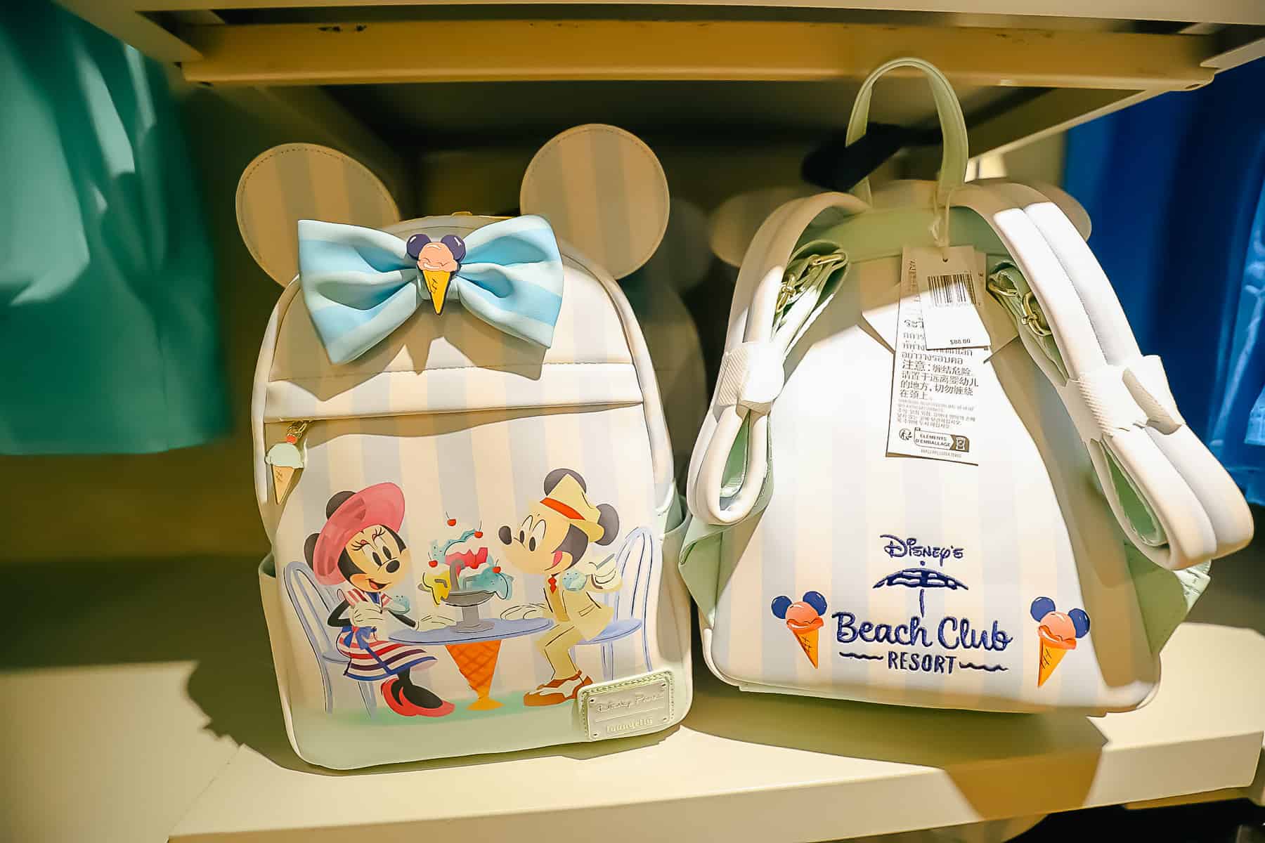 front and back of Disney Beach Club Loungefly 