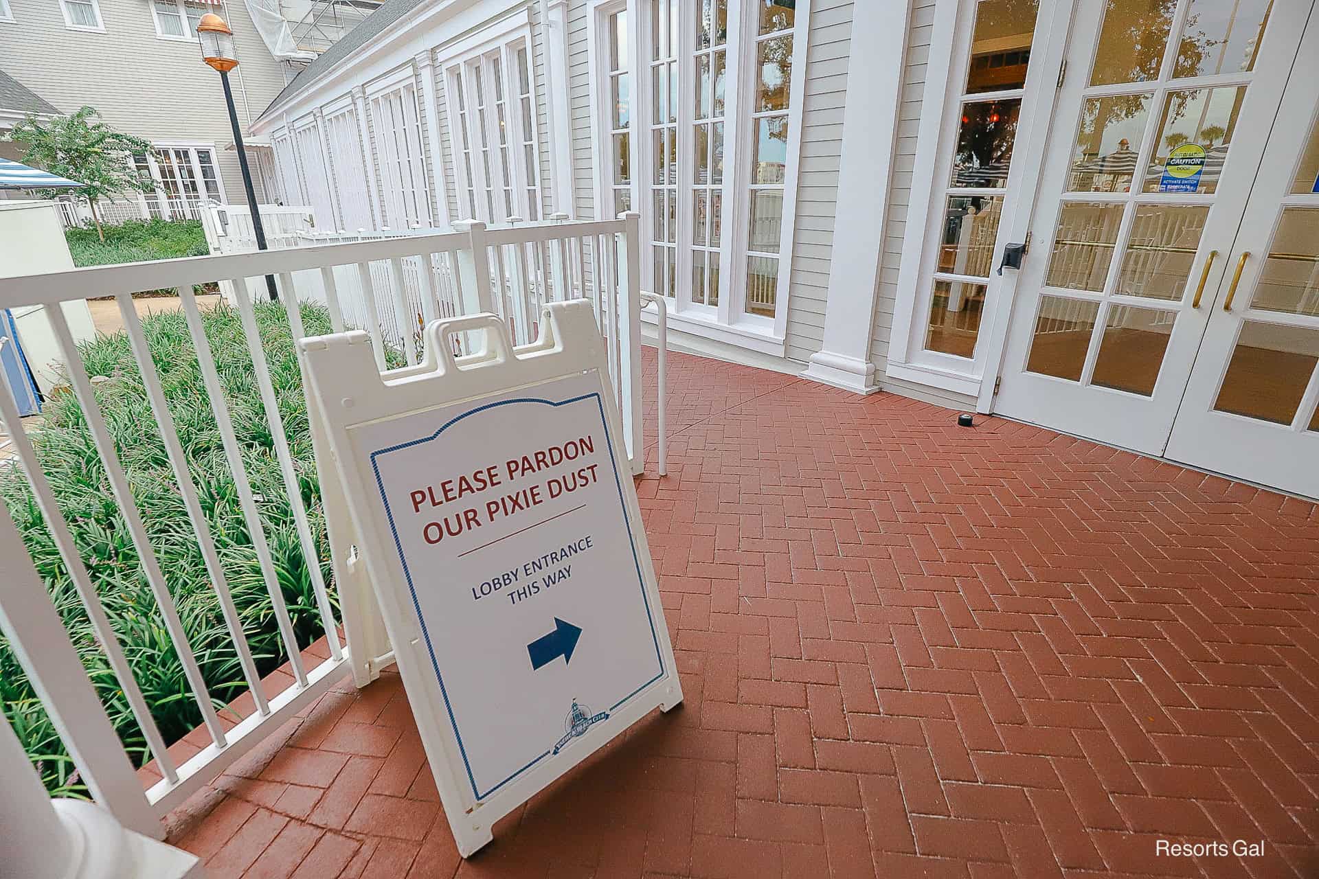 a sign pointing guests to the temporary lobby entrance