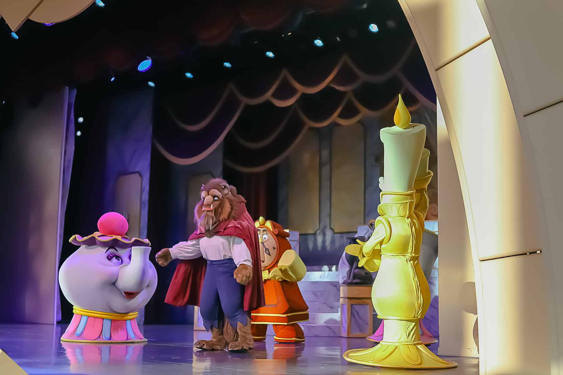 Beast with Mrs. Pots, Cogsworth, and Lumiere