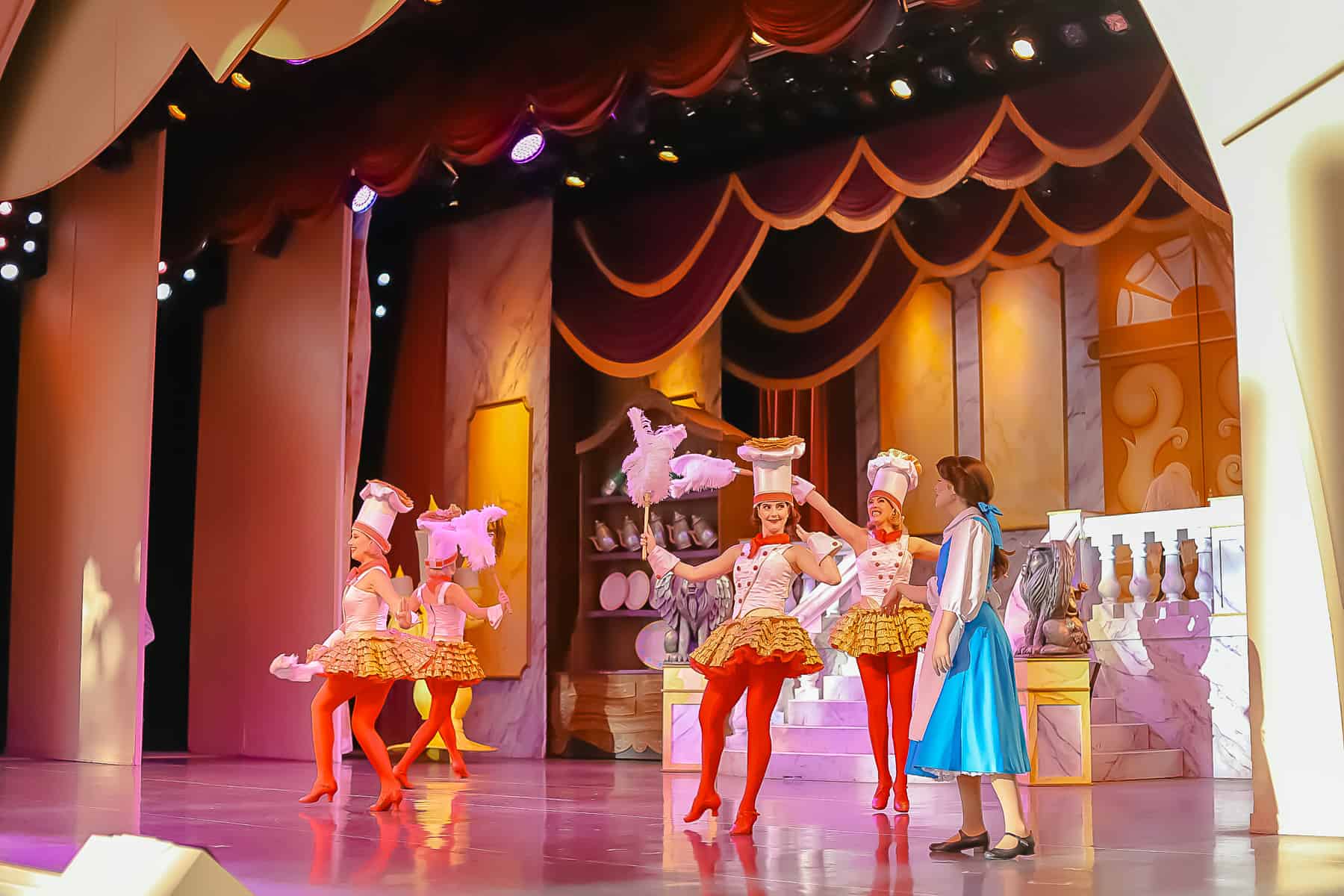 Belle with dancers in the castle. 