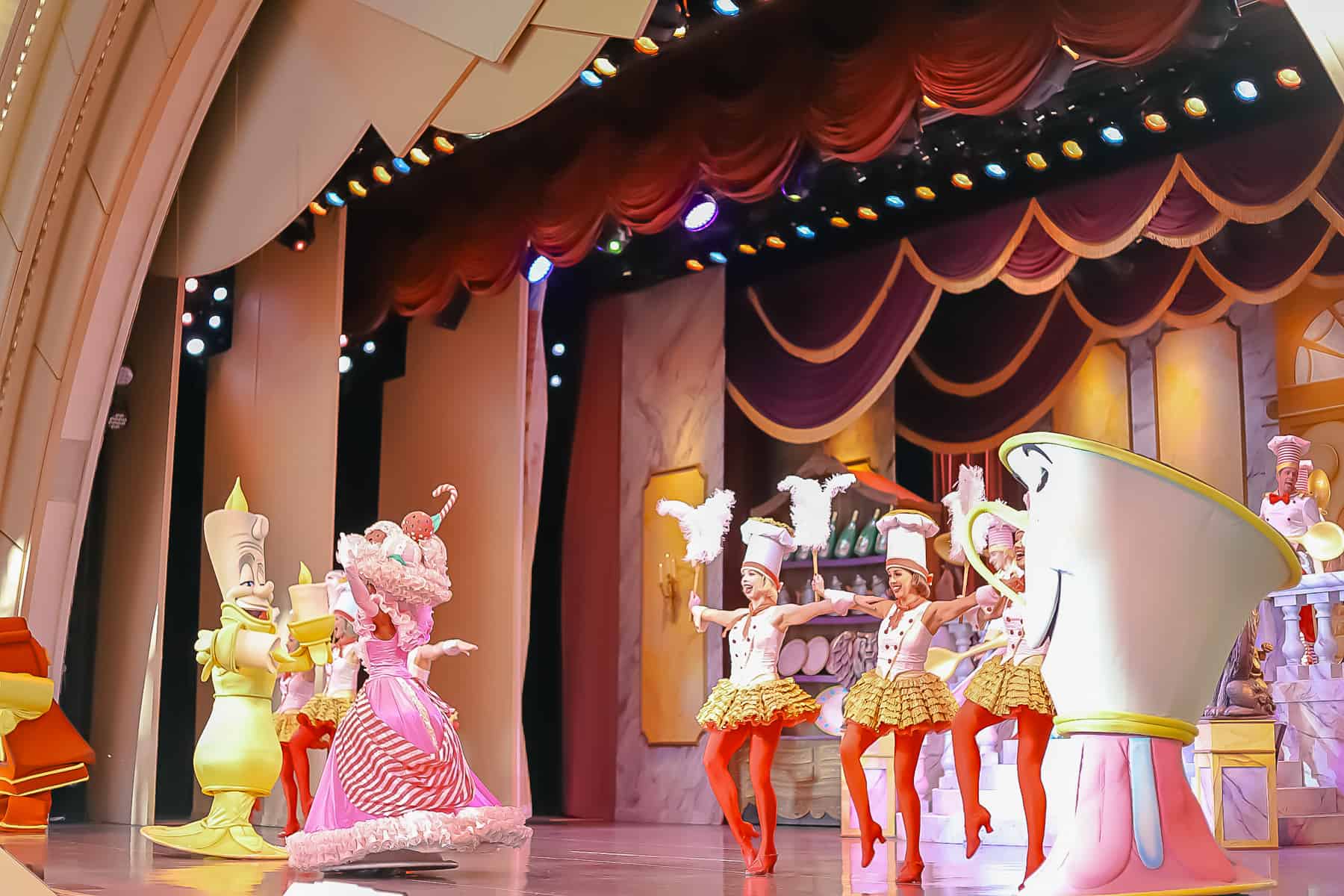 Chip and several other dancers performing on stage. 